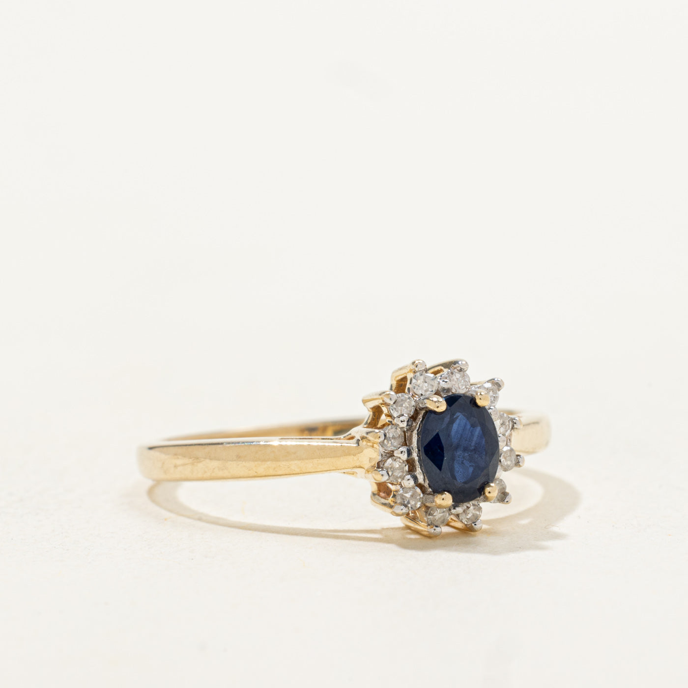 Oval Cut Sapphire & Diamond Petal Halo Ring | 0.41ct, 0.06ctw | SZ 8.25 |