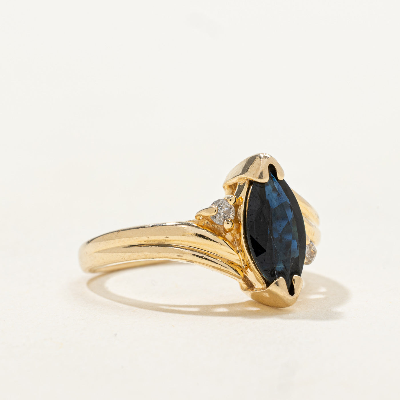 Marquise Cut Sapphire & Diamond Grooved Bypass Ring | 0.82ctw, 0.05ctw | SZ 3.75 |