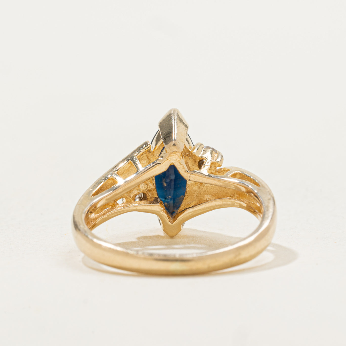 Marquise Cut Sapphire & Diamond Grooved Bypass Ring | 0.82ctw, 0.05ctw | SZ 3.75 |