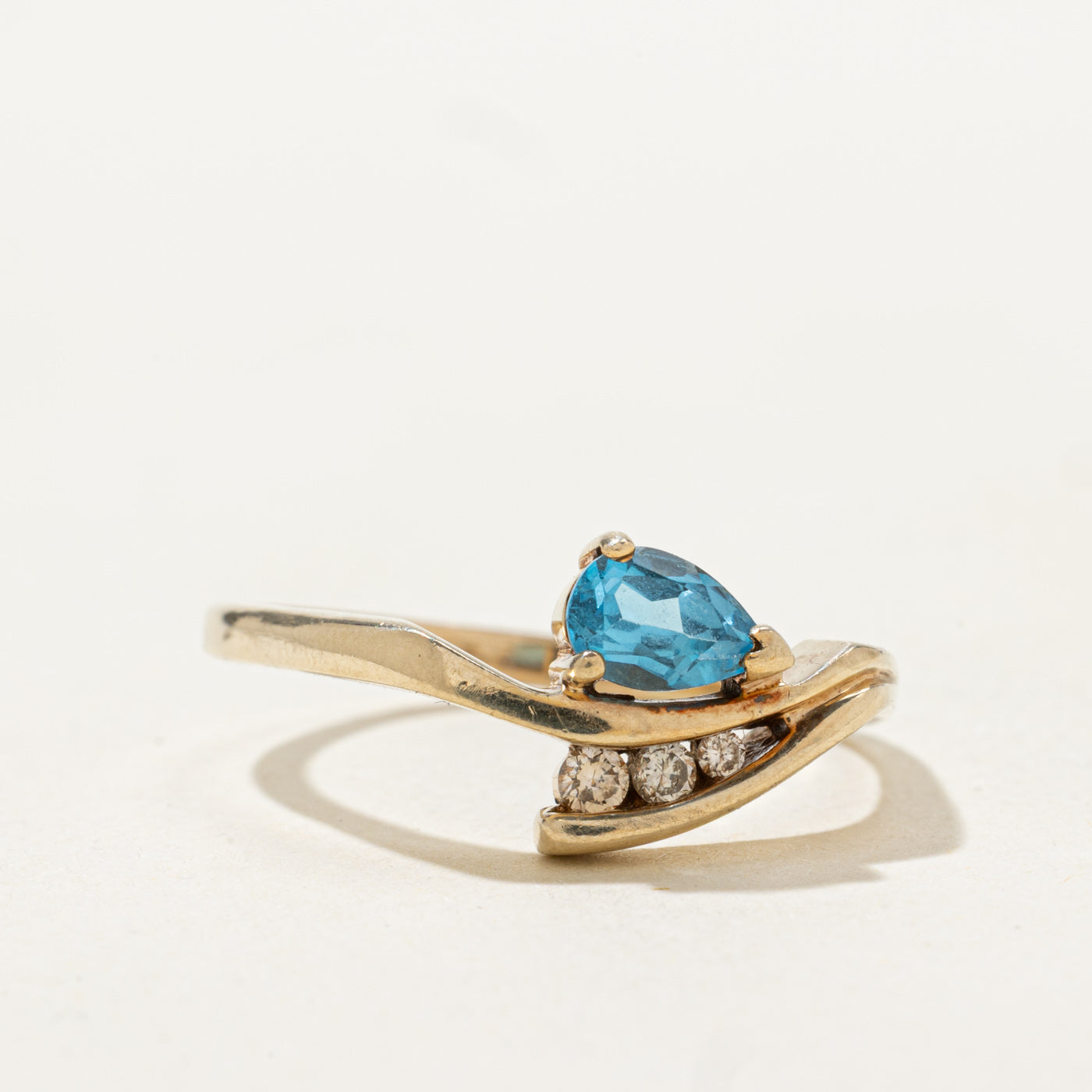 Pear Cut Blue Topaz & Diamond Bypass Ring | 0.45ct, 0.04ctw | SZ 9.0 |