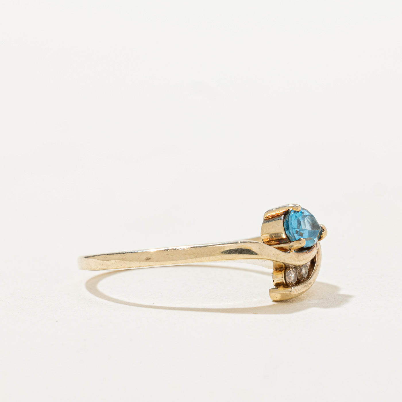 Pear Cut Blue Topaz & Diamond Bypass Ring | 0.45ct, 0.04ctw | SZ 9.0 |