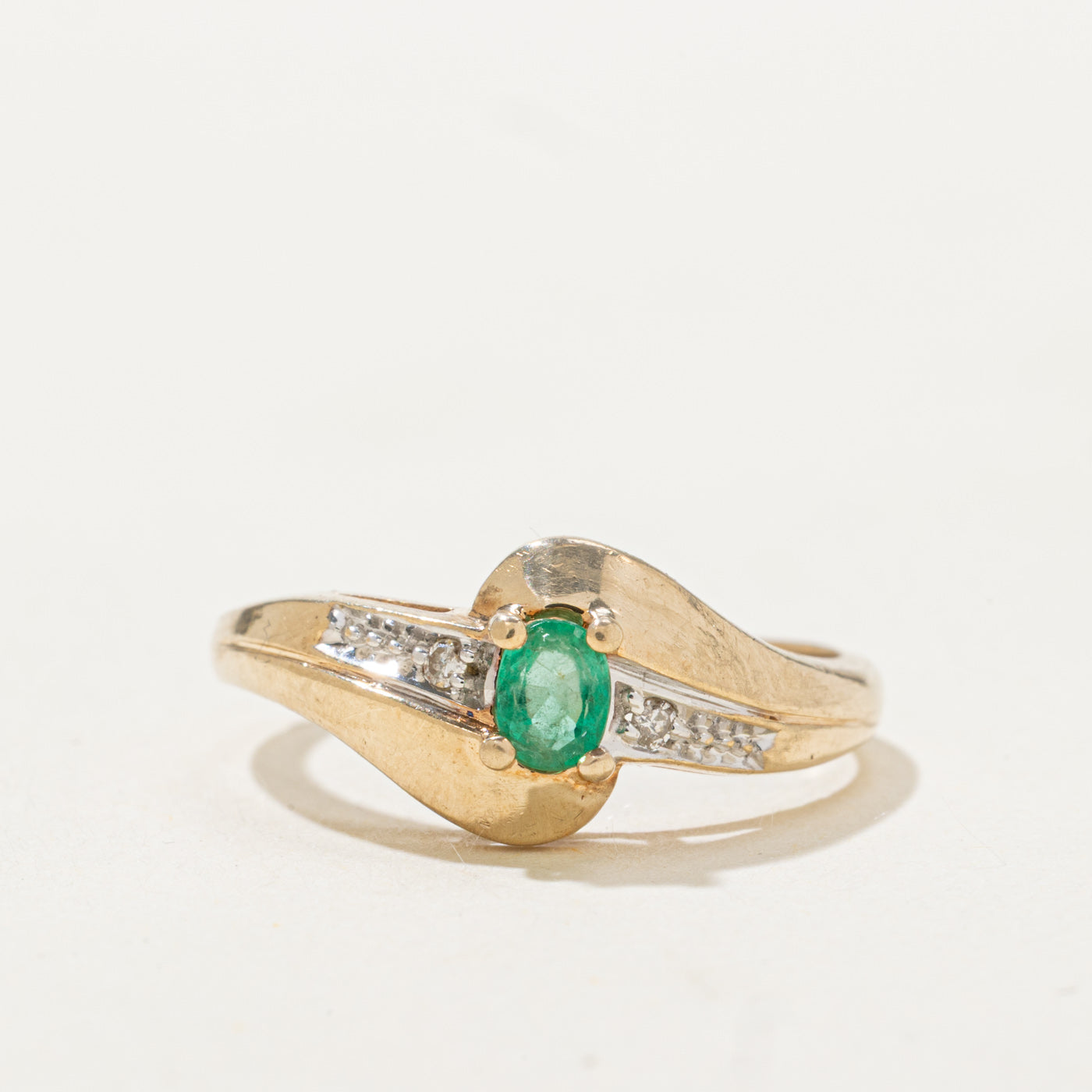 Oval Cut Emerald & Diamond Bypass Ring | 0.14ct, 0.02ctw | SZ 6.25 |