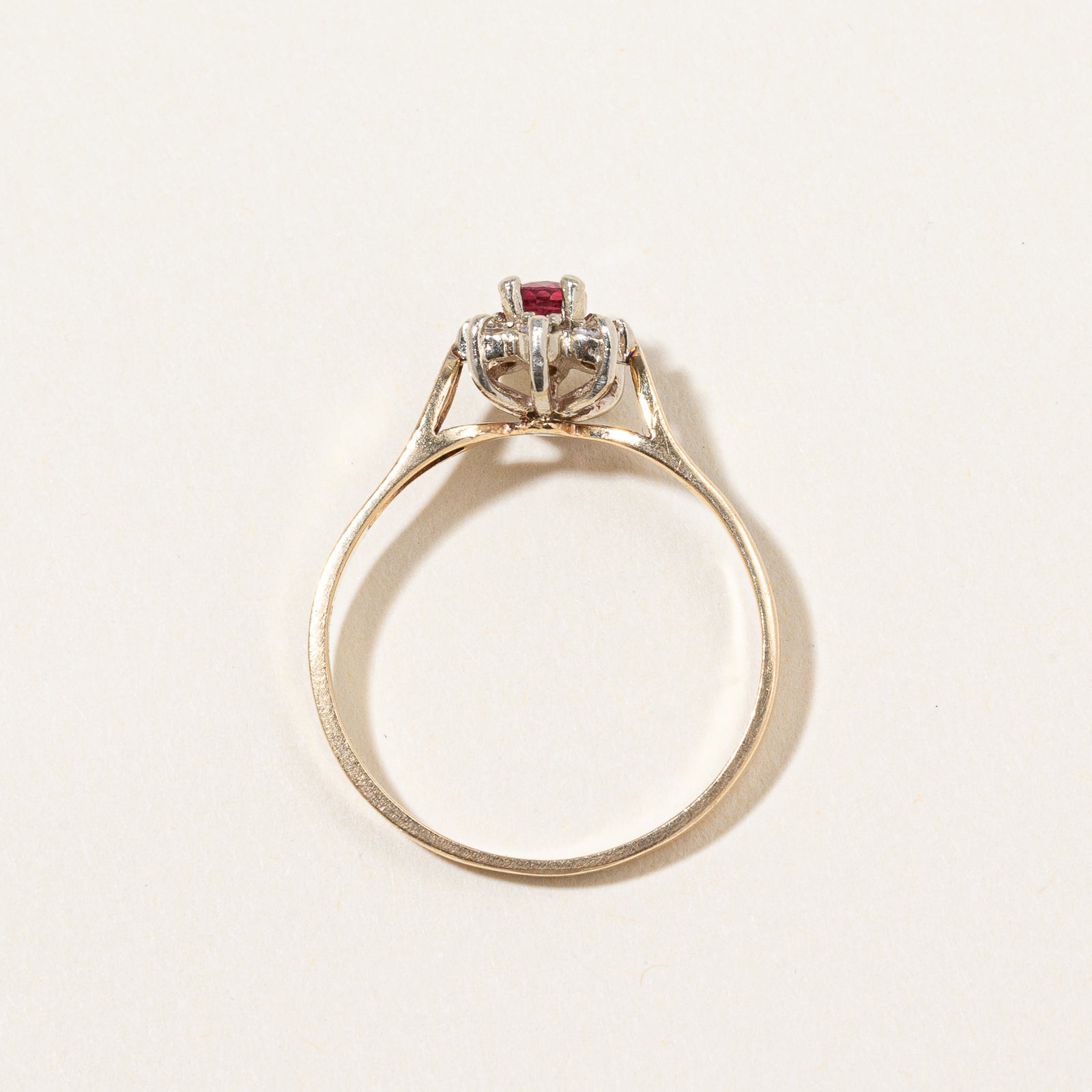 Ruby & Diamond Halo Ring | 0.25ct, 0.06ctw | SZ 7.75 |