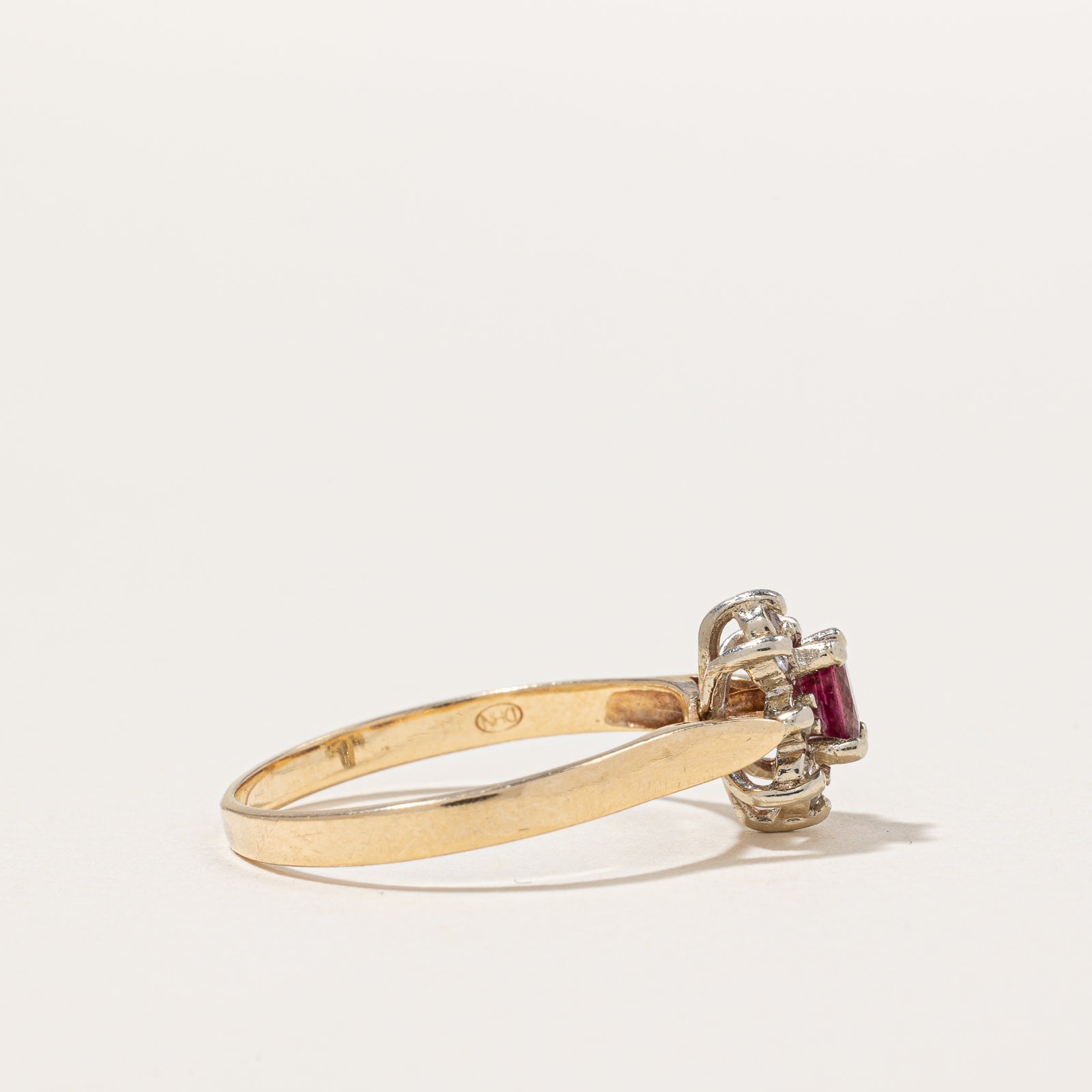 Ruby & Diamond Halo Ring | 0.25ct, 0.06ctw | SZ 7.75 |