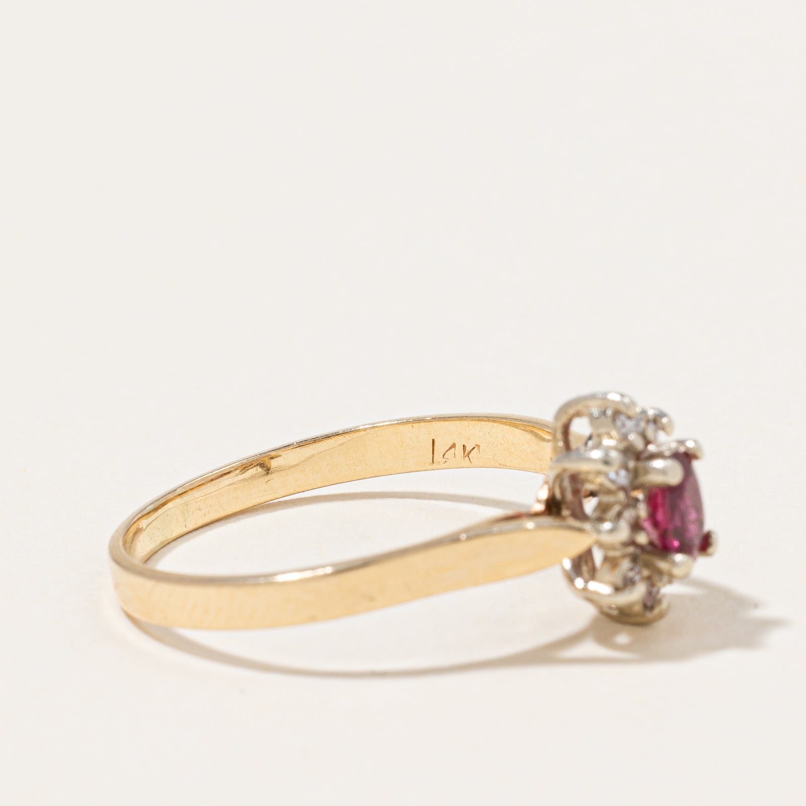 Ruby & Diamond Halo Ring | 0.25ct, 0.06ctw | SZ 7.75 |