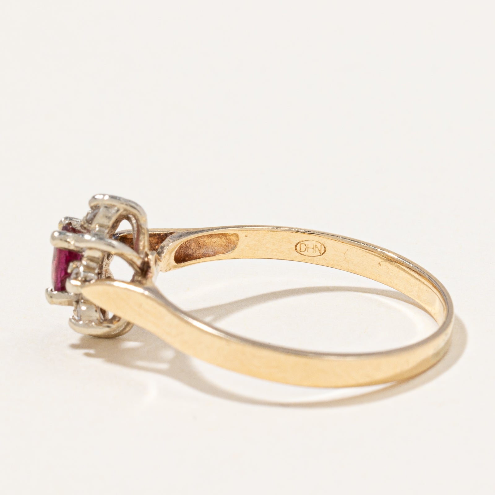 Ruby & Diamond Halo Ring | 0.25ct, 0.06ctw | SZ 7.75 |