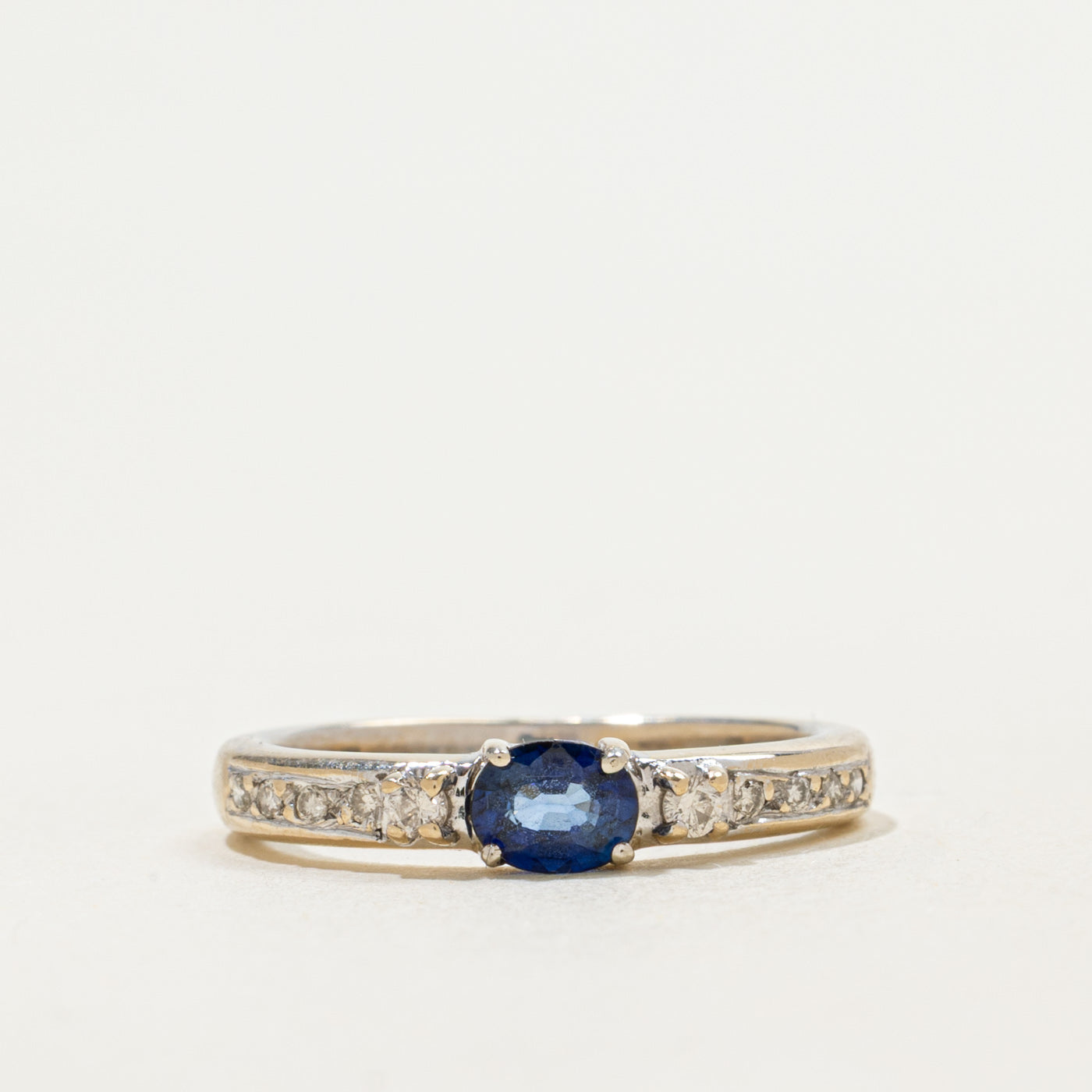 18k East West Sapphire & Diamond Accented Ring | 0.20ct, 0.08ctw | SZ 4.75 |