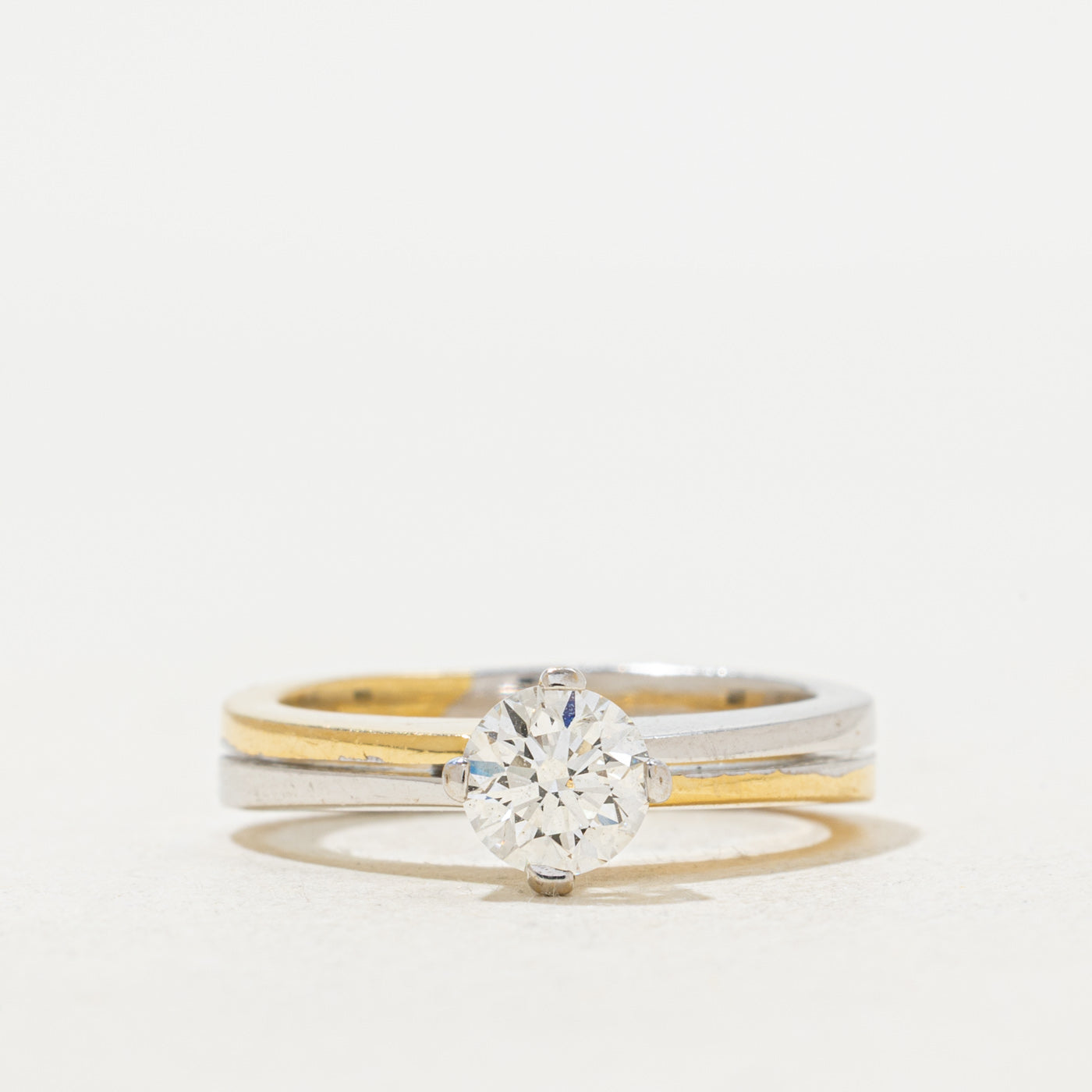 Bague en or bicolore sertie de diamants | 0,71 ct, taille 6 |
