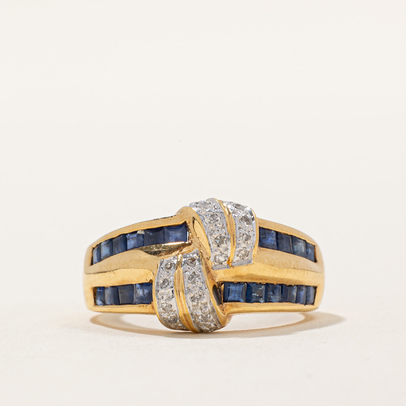 Sapphire & Diamond Knot Ring | 0.60ctw, 0.06ctw | SZ 6.25 |