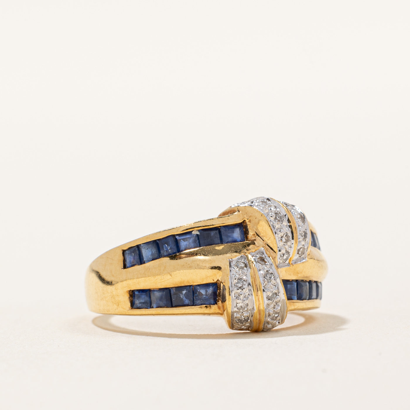 Sapphire & Diamond Knot Ring | 0.60ctw, 0.06ctw | SZ 6.25 |
