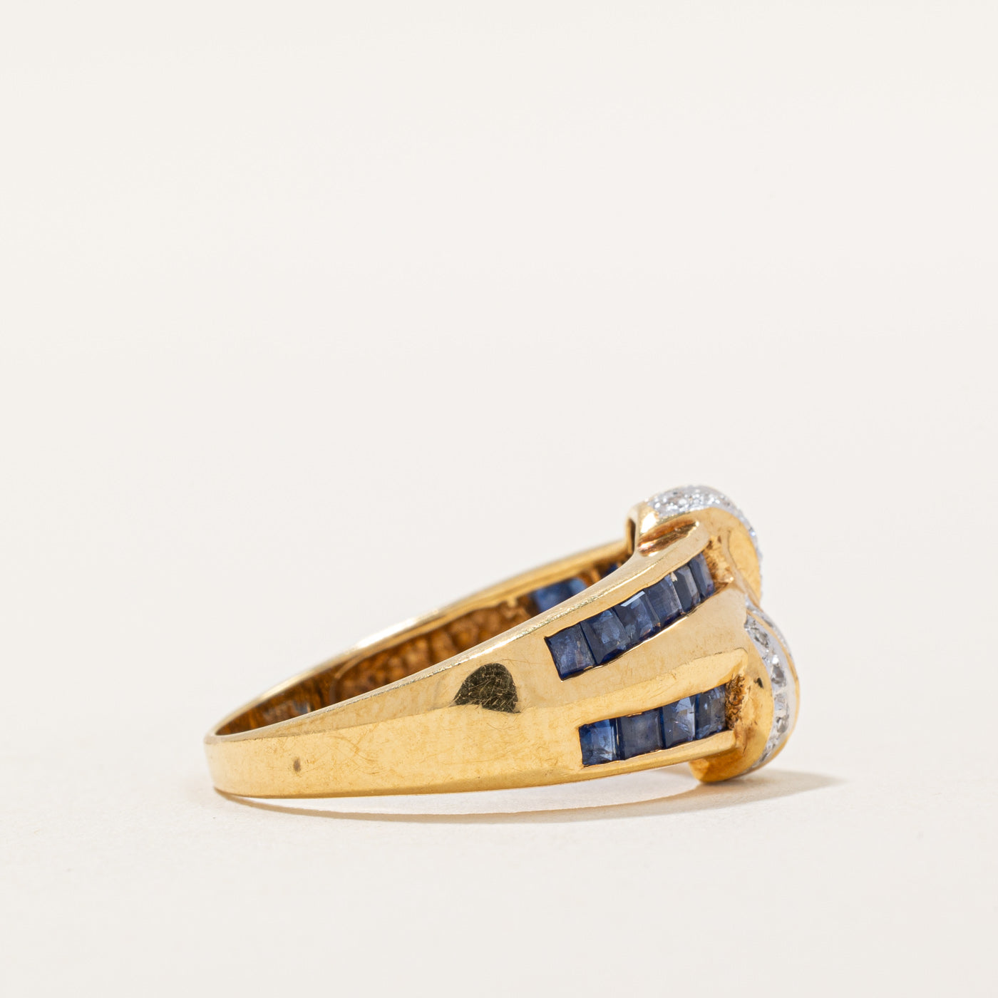 Sapphire & Diamond Knot Ring | 0.60ctw, 0.06ctw | SZ 6.25 |