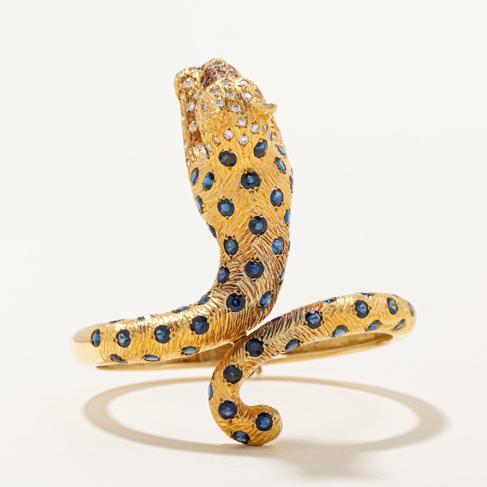'Maramenos & Pateras' Sapphire, Diamond & Pink Sapphire Panther Bracelet | 8.29ctw | 1.30ctw | 6.5"