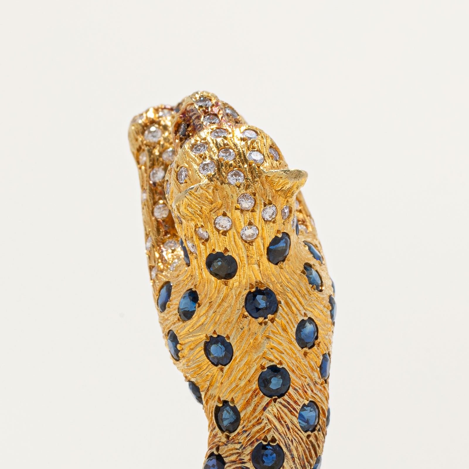 'Maramenos & Pateras' Sapphire, Diamond & Pink Sapphire Panther Bracelet | 8.29ctw | 1.30ctw | 6.5"