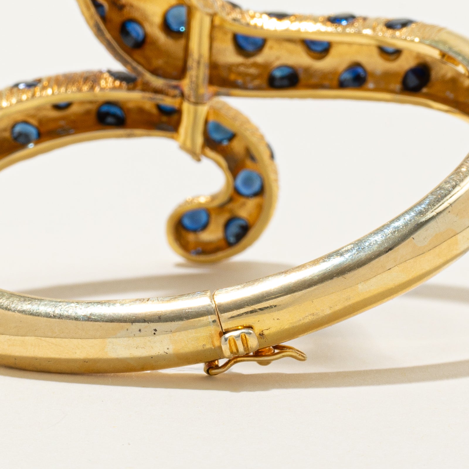'Maramenos & Pateras' Sapphire, Diamond & Pink Sapphire Panther Bracelet | 8.29ctw | 1.30ctw | 6.5"