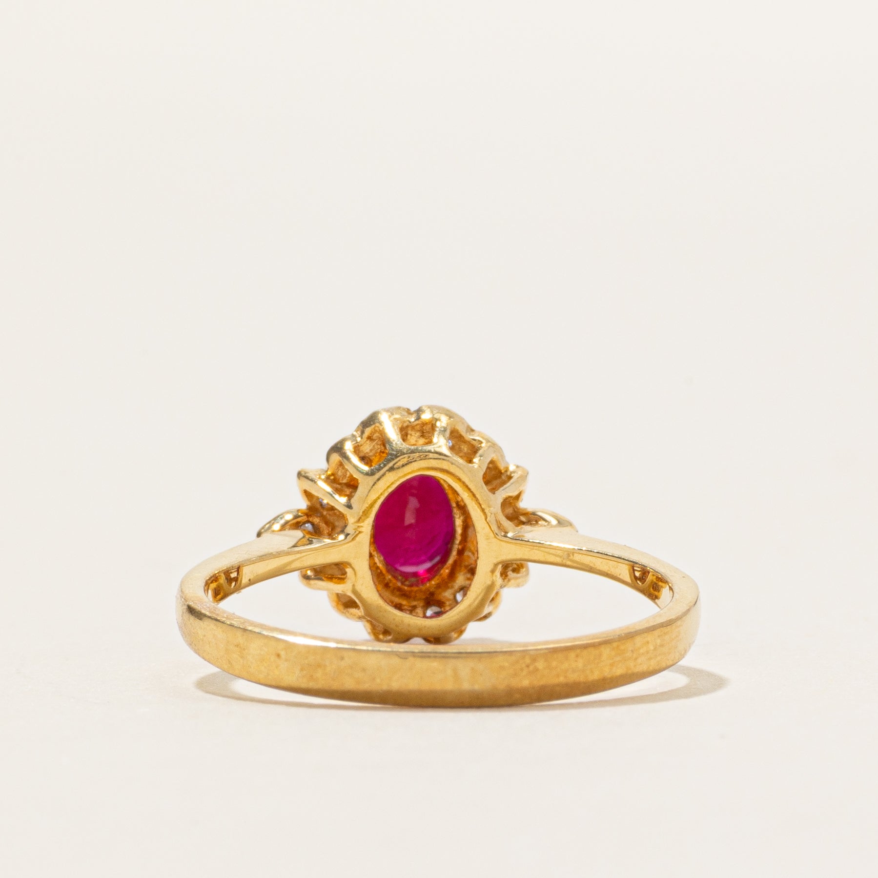 18k Ruby & Diamond Halo Ring | 0.80ct, 0.10ctw | SZ 5.5