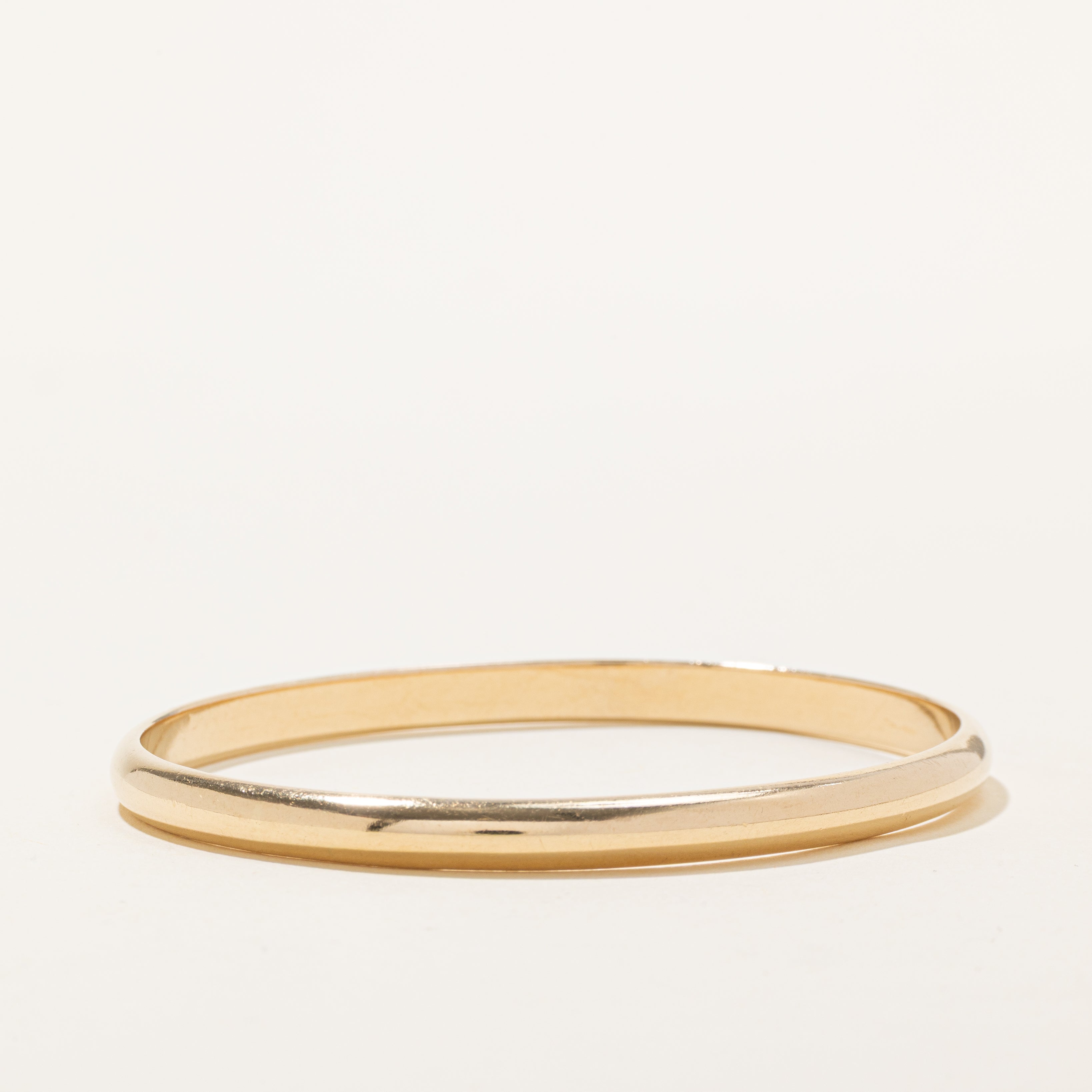 'Tiffany & Co' Vintage 14k Yellow Gold Plain Bangle | 7"