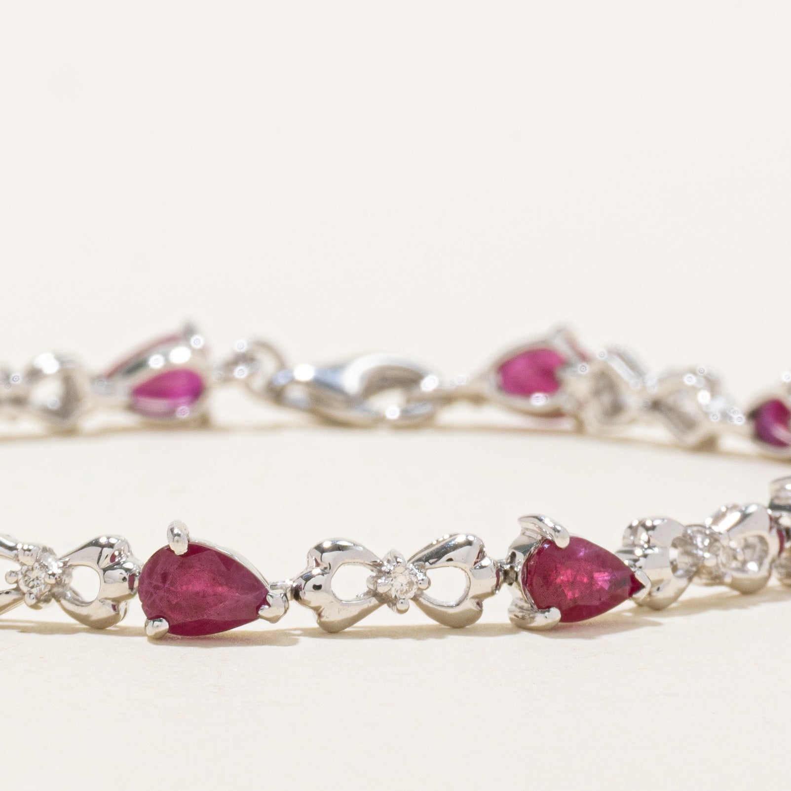 18k White Gold Pear Cut Ruby & Diamond Bracelet | 5.00ctw, 0.10ctw | 7"