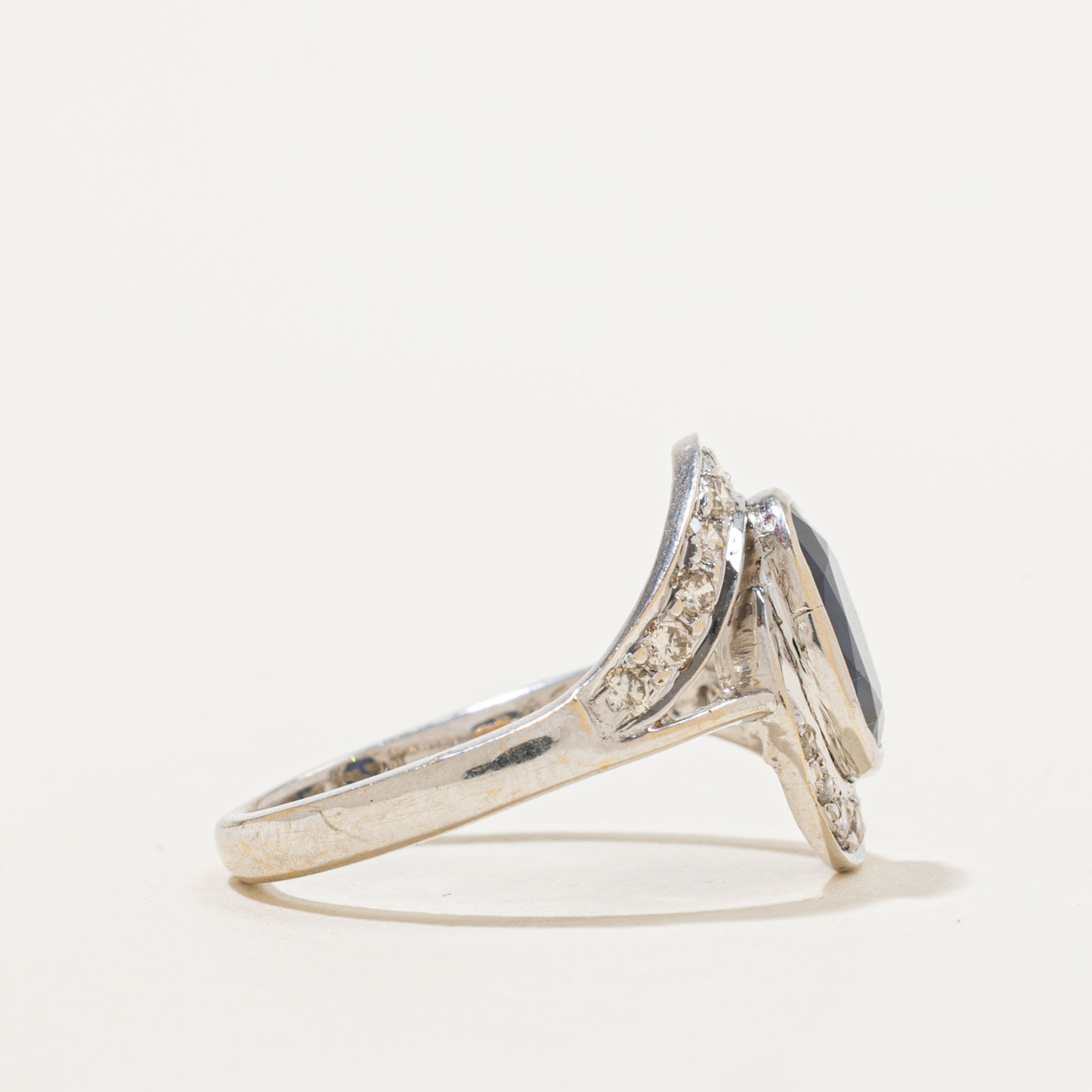 T.K. Anderson's Sapphire and Diamond Bypass Ring | 1.60 ct Sapphire, 0.38ctw DIamonds SZ 7 |