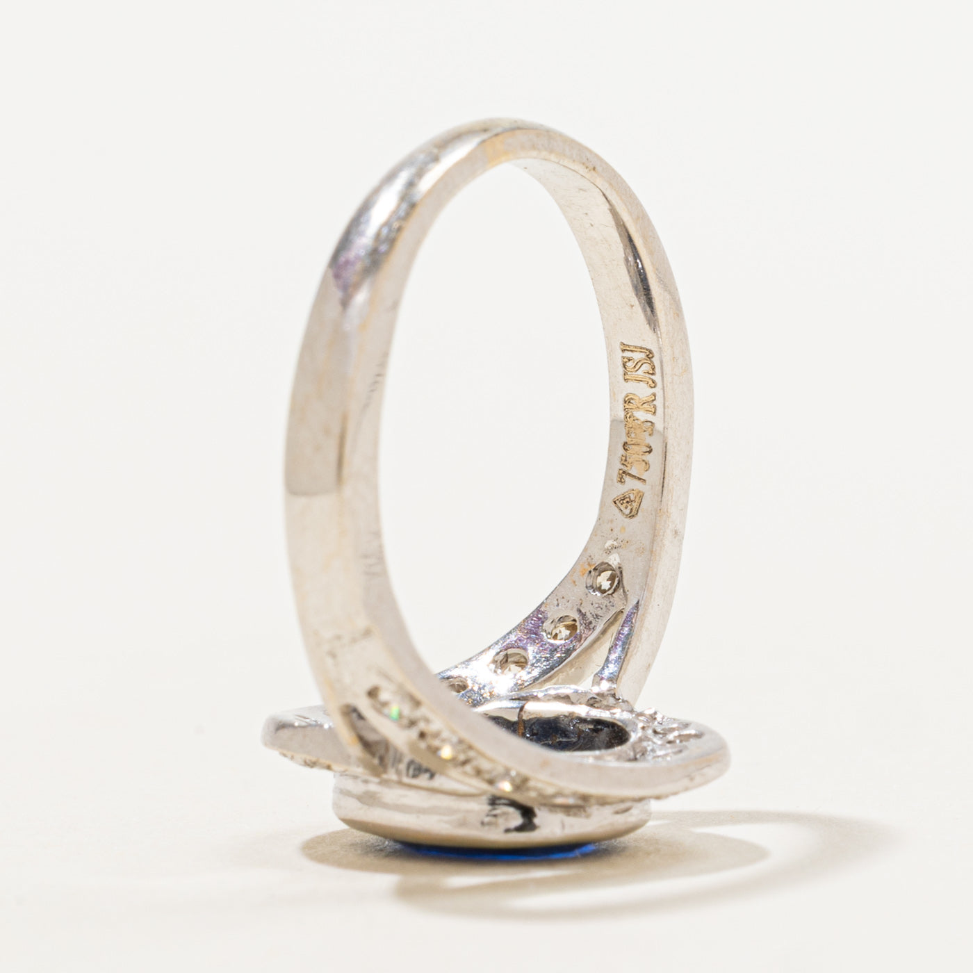 T.K. Anderson's Sapphire and Diamond Bypass Ring | 1.60 ct Sapphire, 0.38ctw DIamonds SZ 7 |
