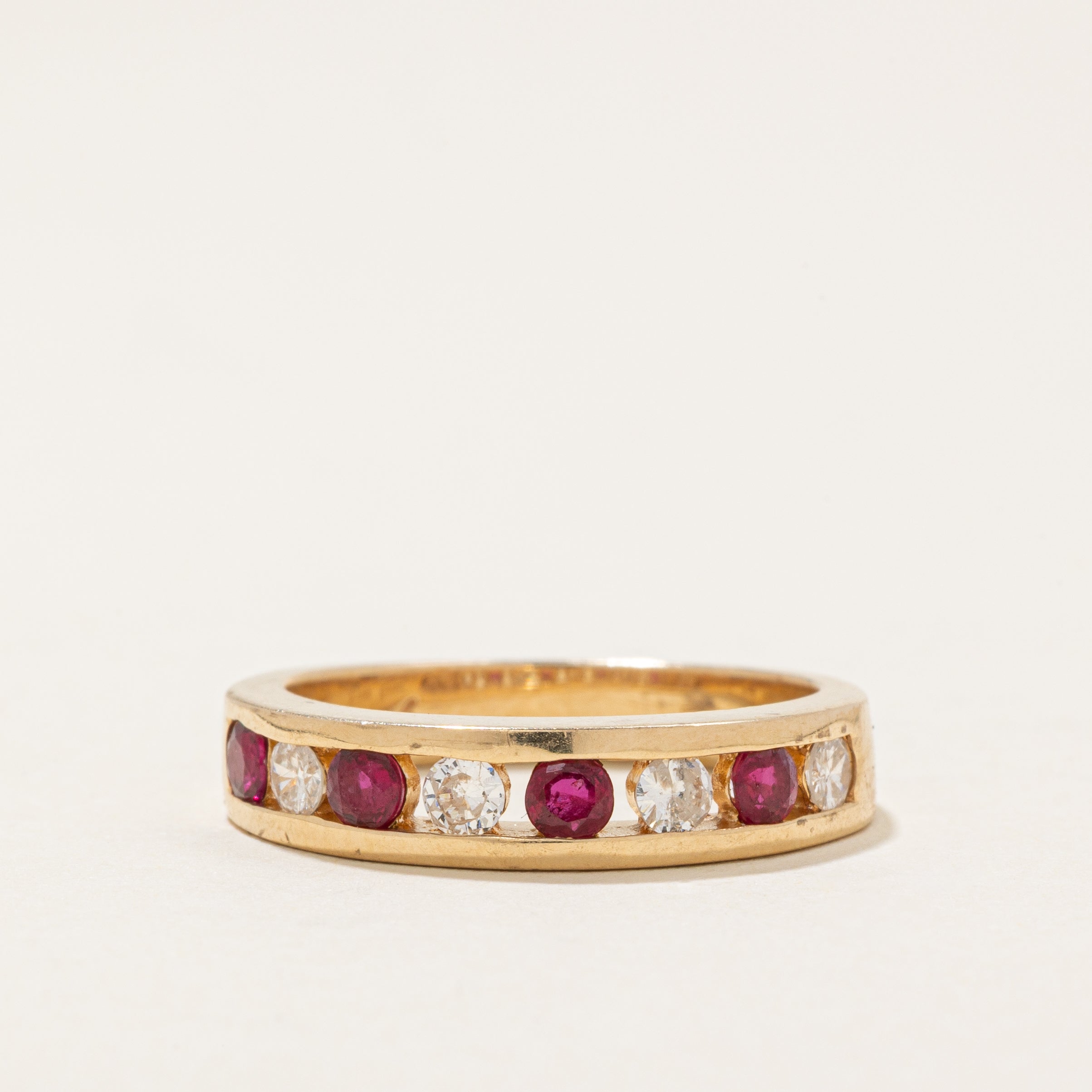 1990 London Import Channel Set Semi Eternity Ruby & Diamond Band | 0.32ctw, 0.24ctw | SZ 6.25 |