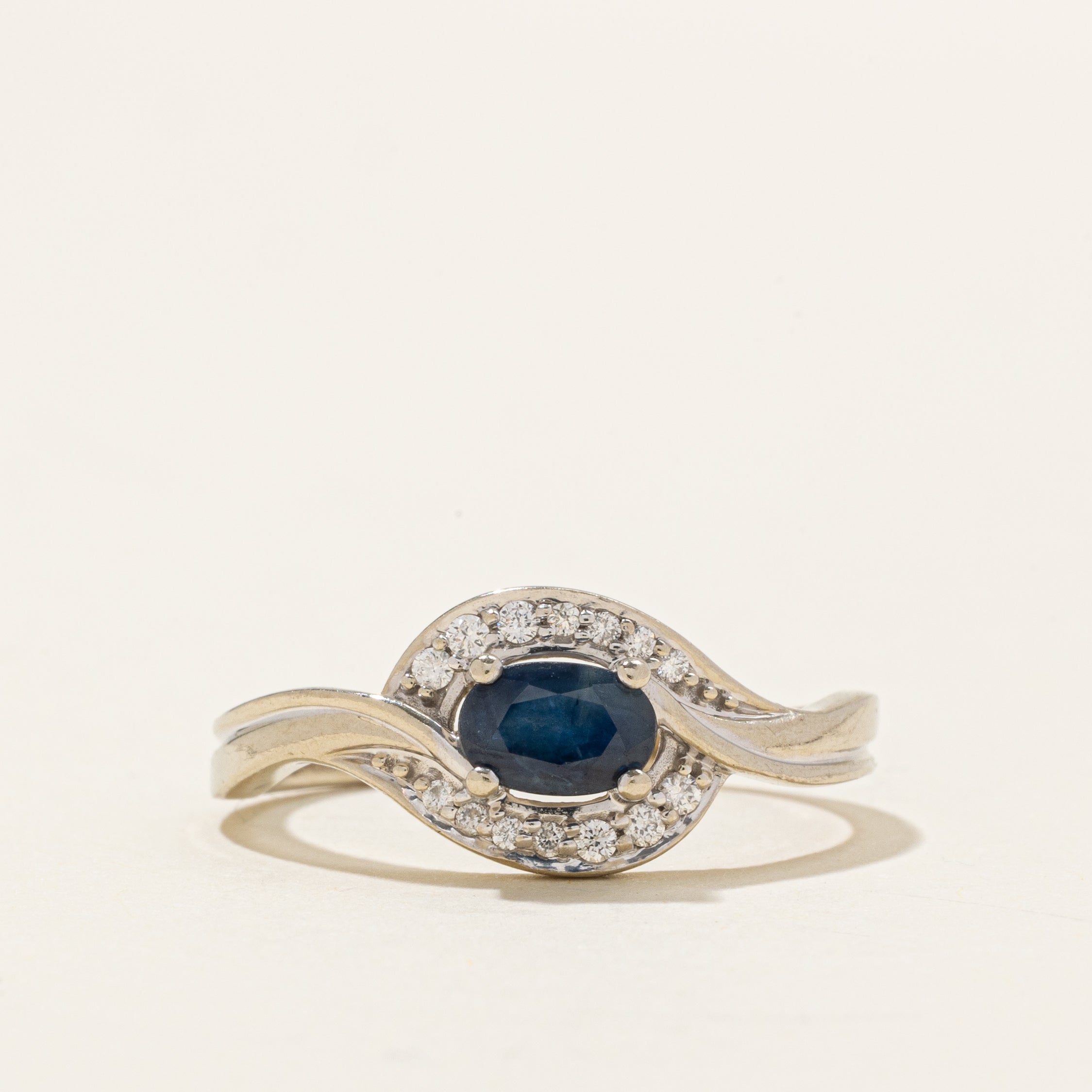 East West Sapphire & Diamond Halo Bypass Ring | 0.55ct, 0.08ctw | SZ 7.75 |