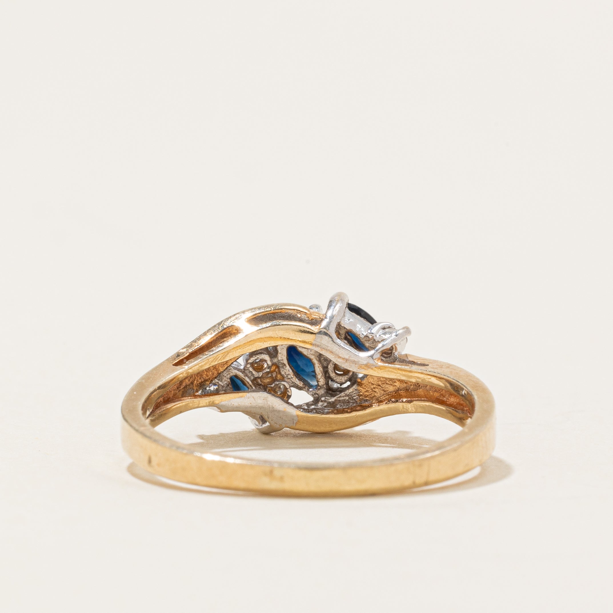 Three Stone Marquise Cut Sapphire & Diamond Bypass Ring | 0/5ctw, 0.03ctw | SZ 7.5 |