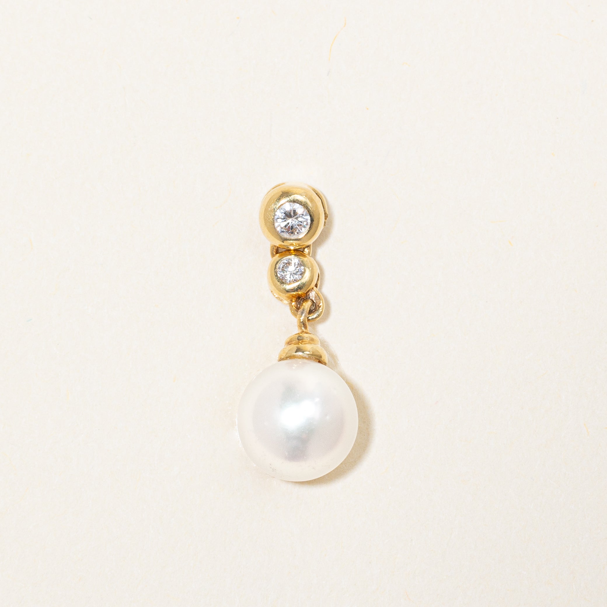 Pendentif goutte serti clos de diamants et de perles | 0,10 ct |