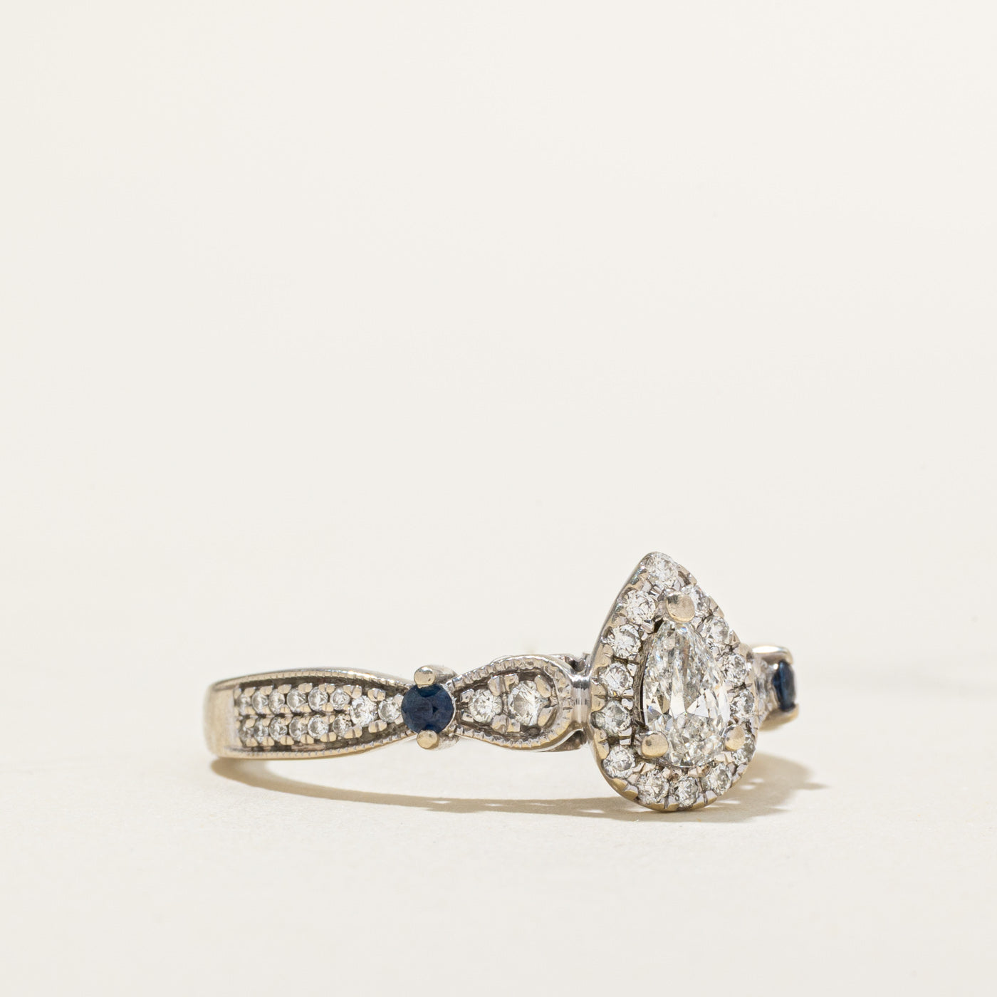 Pear Cut Diamond Halo & Sapphire Ring | 0.65ctw, 0.15ctw | SZ 8.25