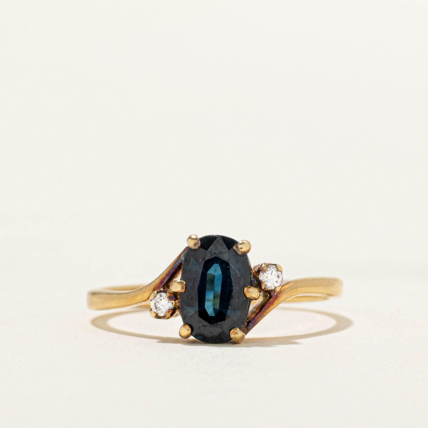 18k Oval Cut Sapphire & Diamond Bypass Ring | 1.24ct, 0.04ctw | SZ 7.5