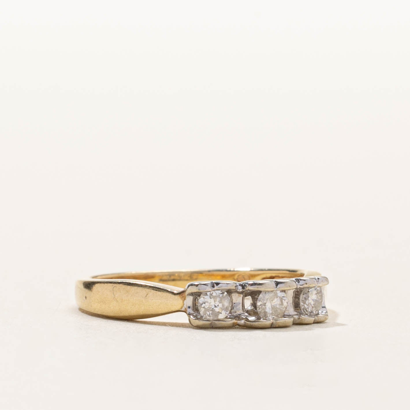 10k Three Stone Tension Set Diamond Reverse Tapered Ring | SZ 7