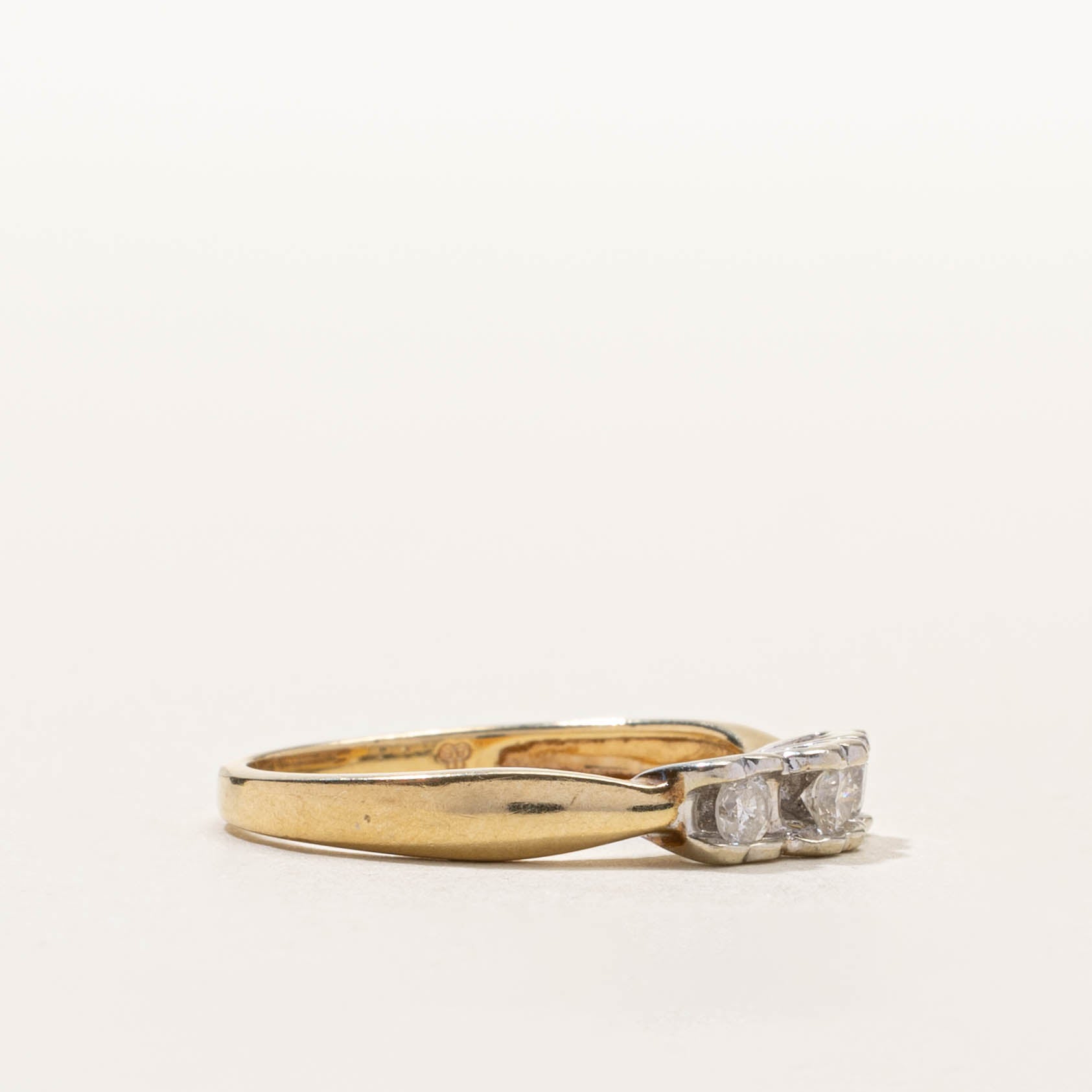 10k Three Stone Tension Set Diamond Reverse Tapered Ring | SZ 7
