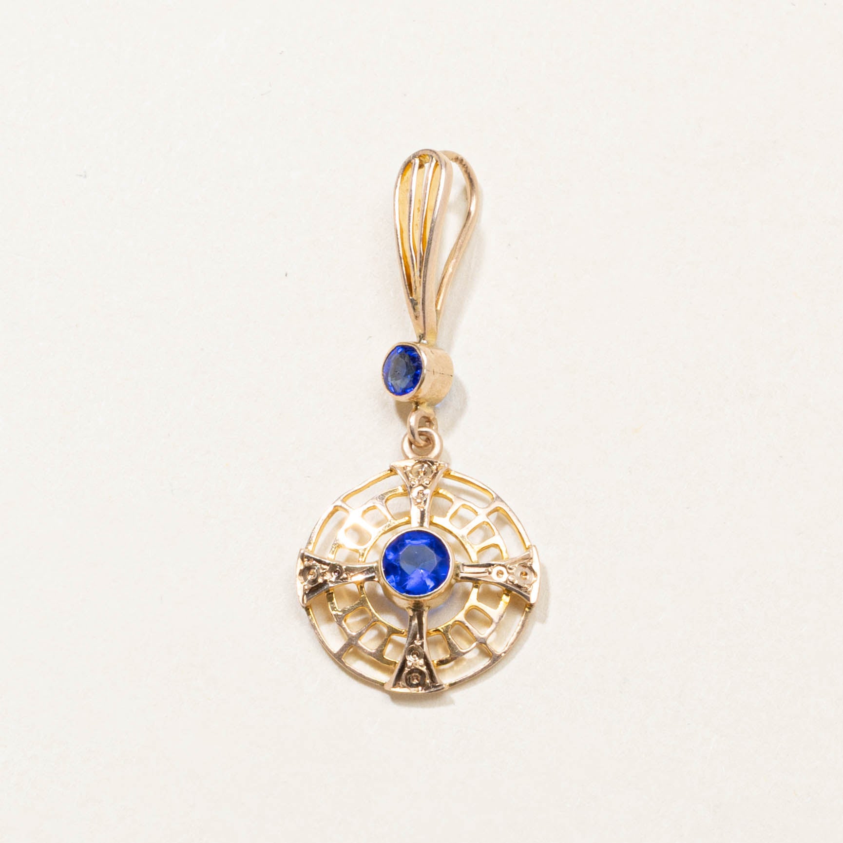 10k Bezel Set Blue Glass Openwork Pendant | 0.35ct