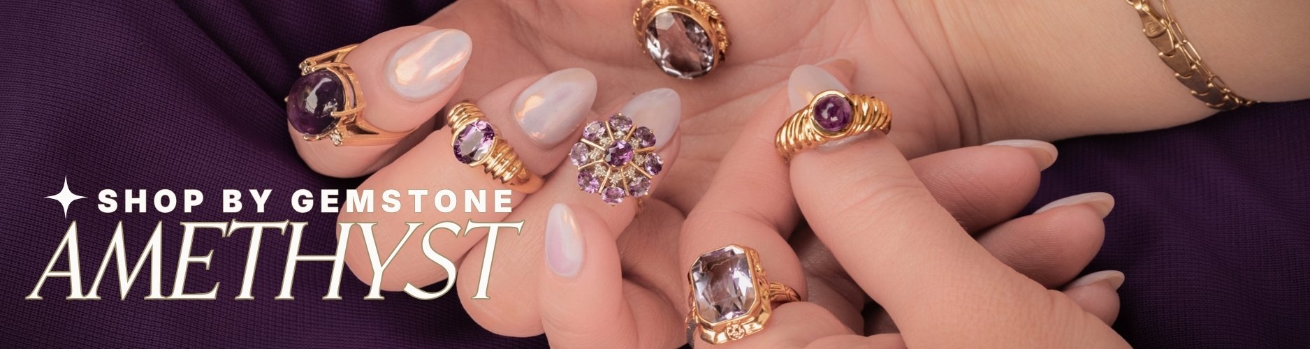 Hand holding various amethyst rings on purple background, text overlay reads: shop by gemstone; amethyst