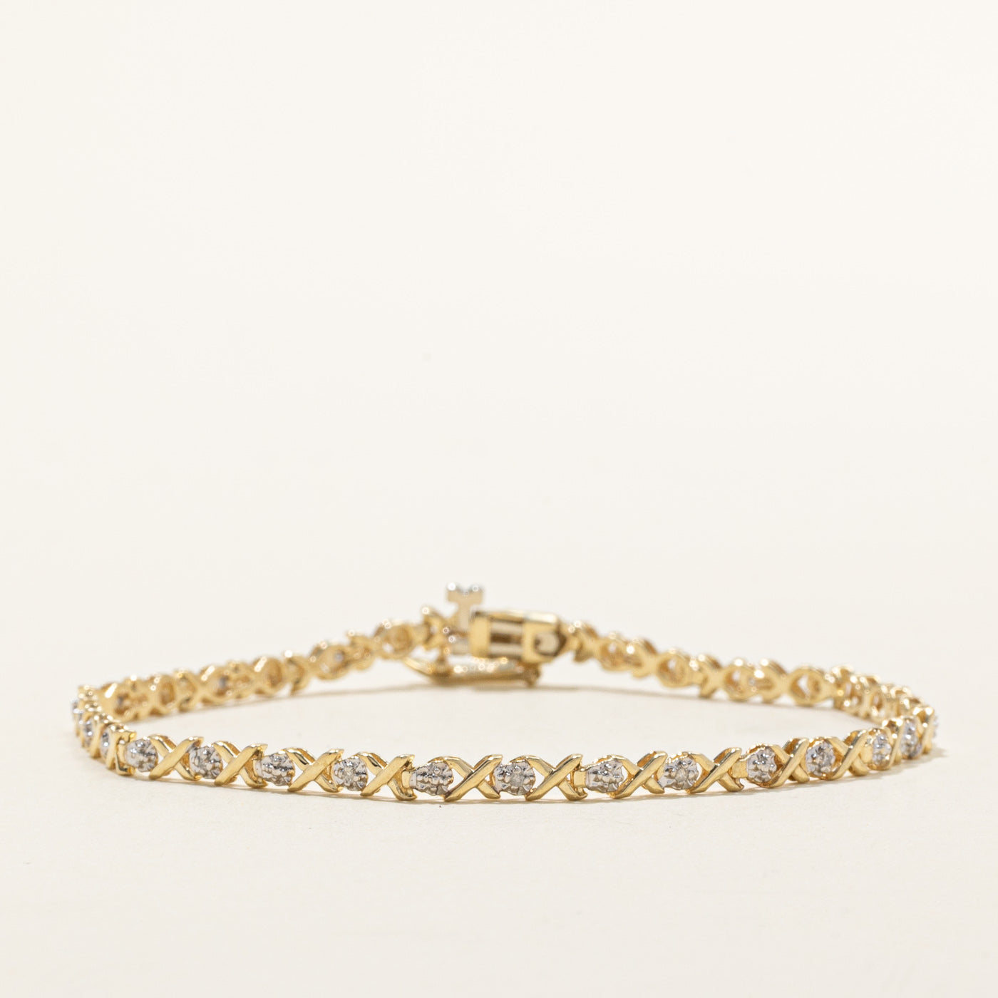 10K Diamond Crossover Tennis Bracelet | 0.10ctw | 7.25"
