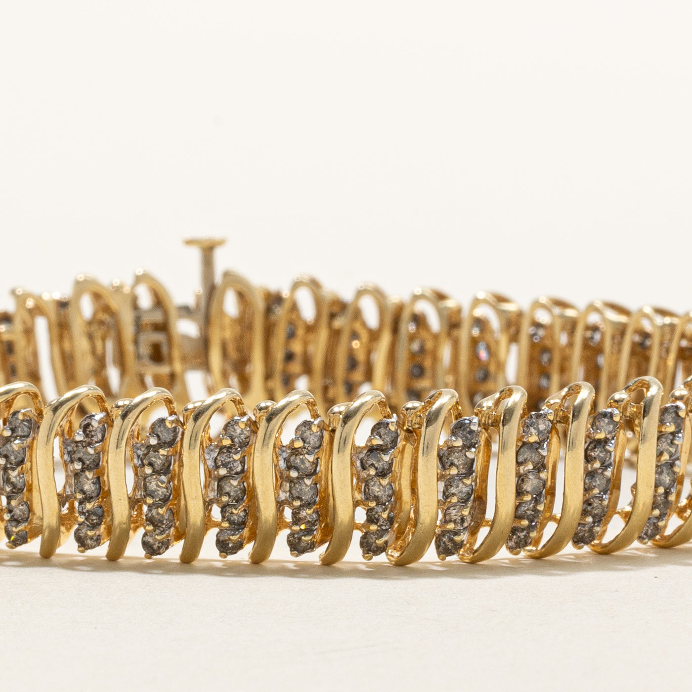 Bracelet tennis en or 14 carats serti de diamants tourbillonnants | 1,00 ct au total | 18,4 cm
