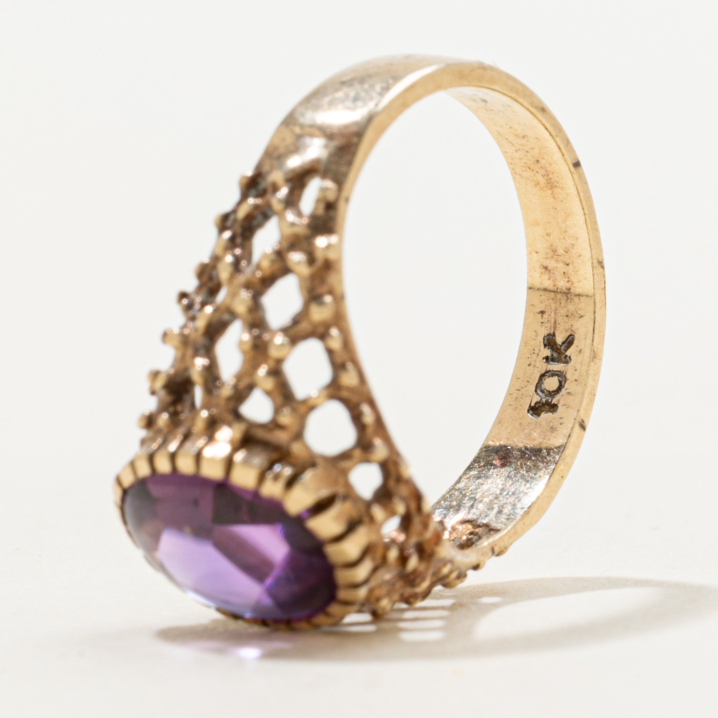 10K Ring with Oval Buff Cut Synthetic Sapphire