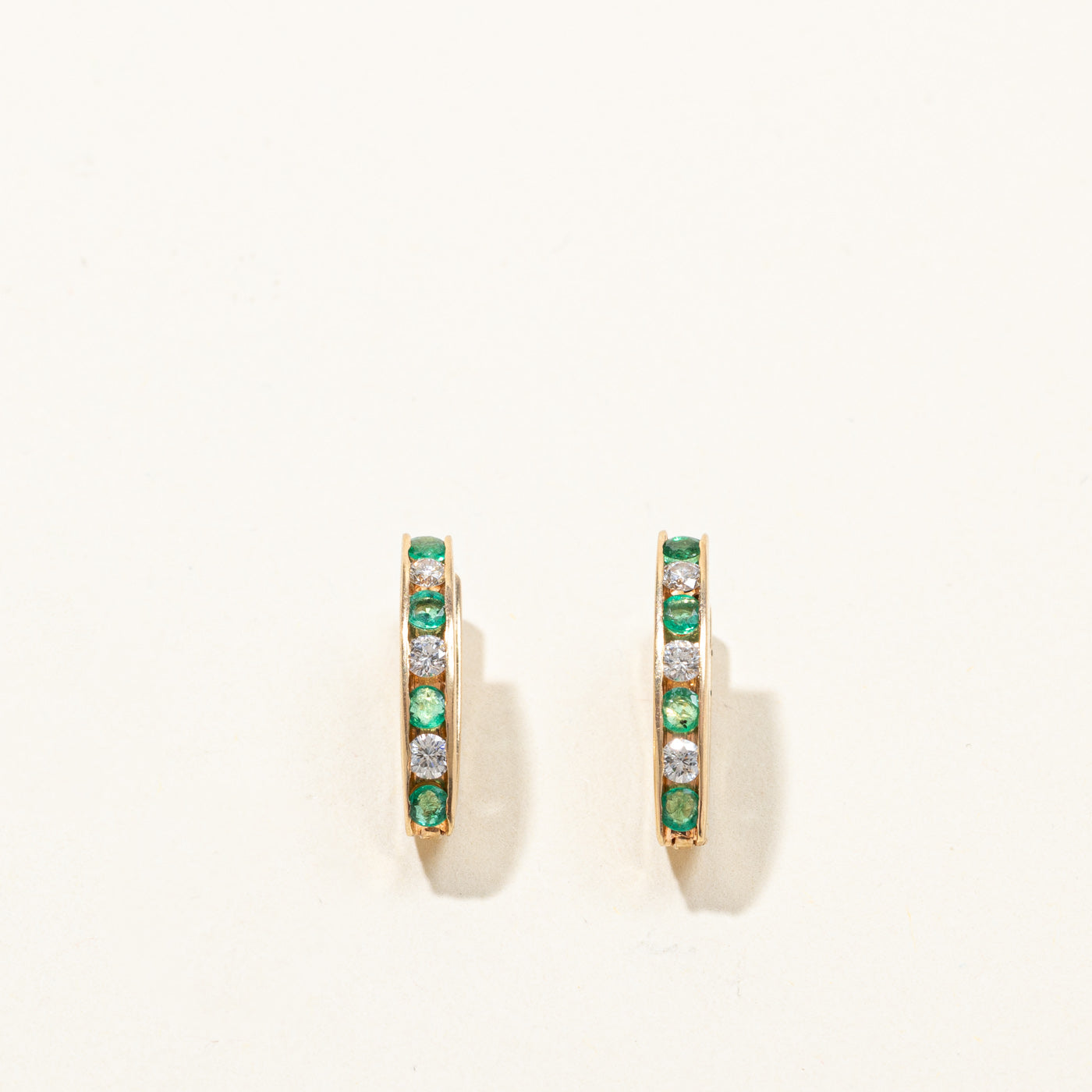Channel Set Emerald & Diamond Huggie Earrings | 0.38ctw | 0.24ctw |