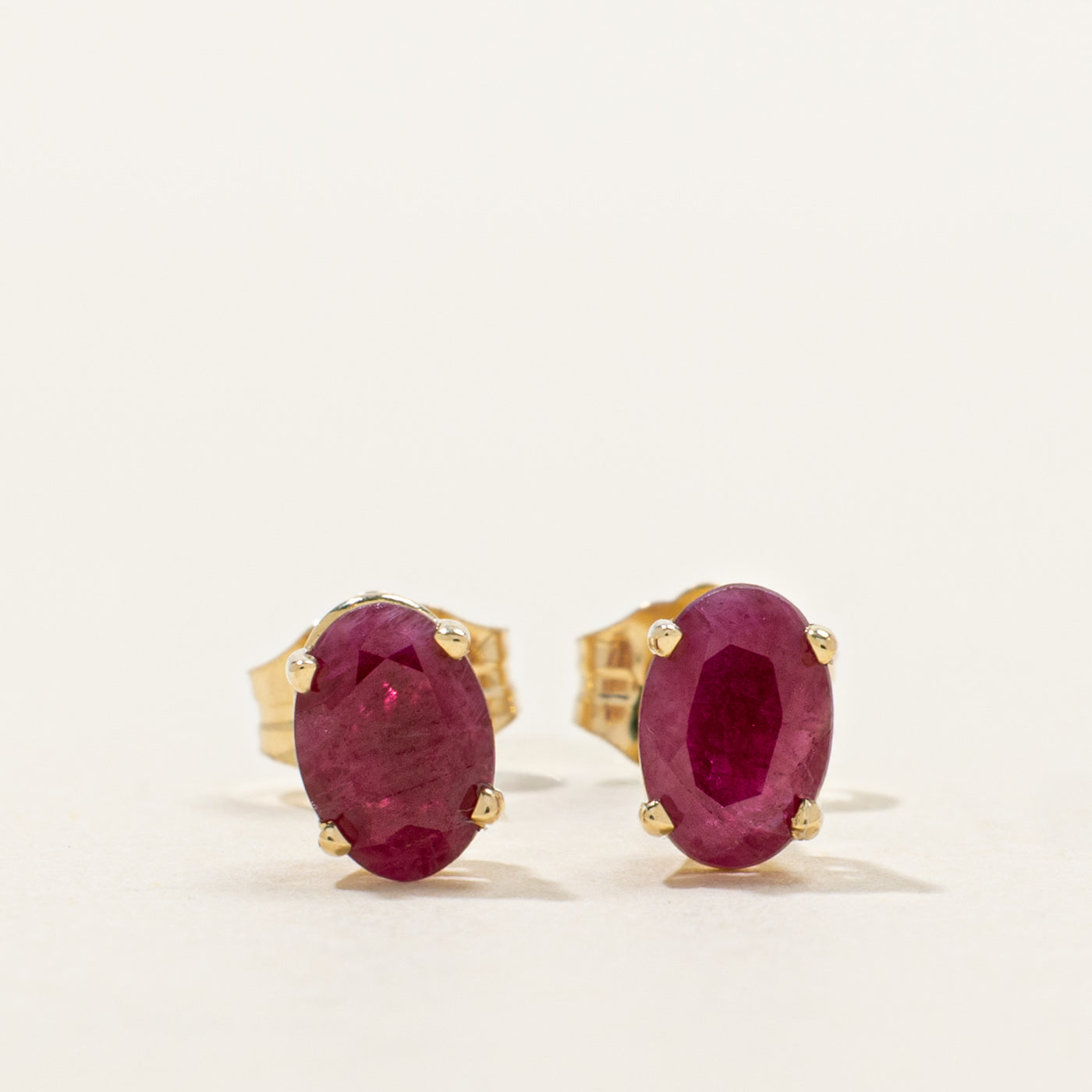 '100 Ways' Oval Cut Ruby Solitaire Stud Earrings | 1.0ctw