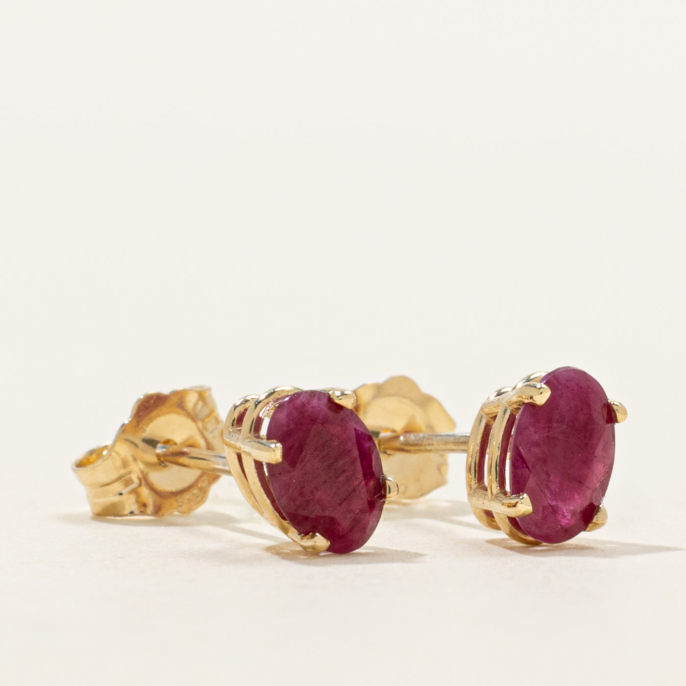 '100 Ways' Oval Cut Ruby Solitaire Stud Earrings | 1.0ctw
