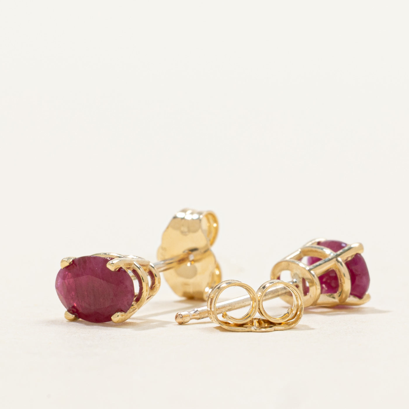 '100 Ways' Oval Cut Ruby Solitaire Stud Earrings | 1.0ctw
