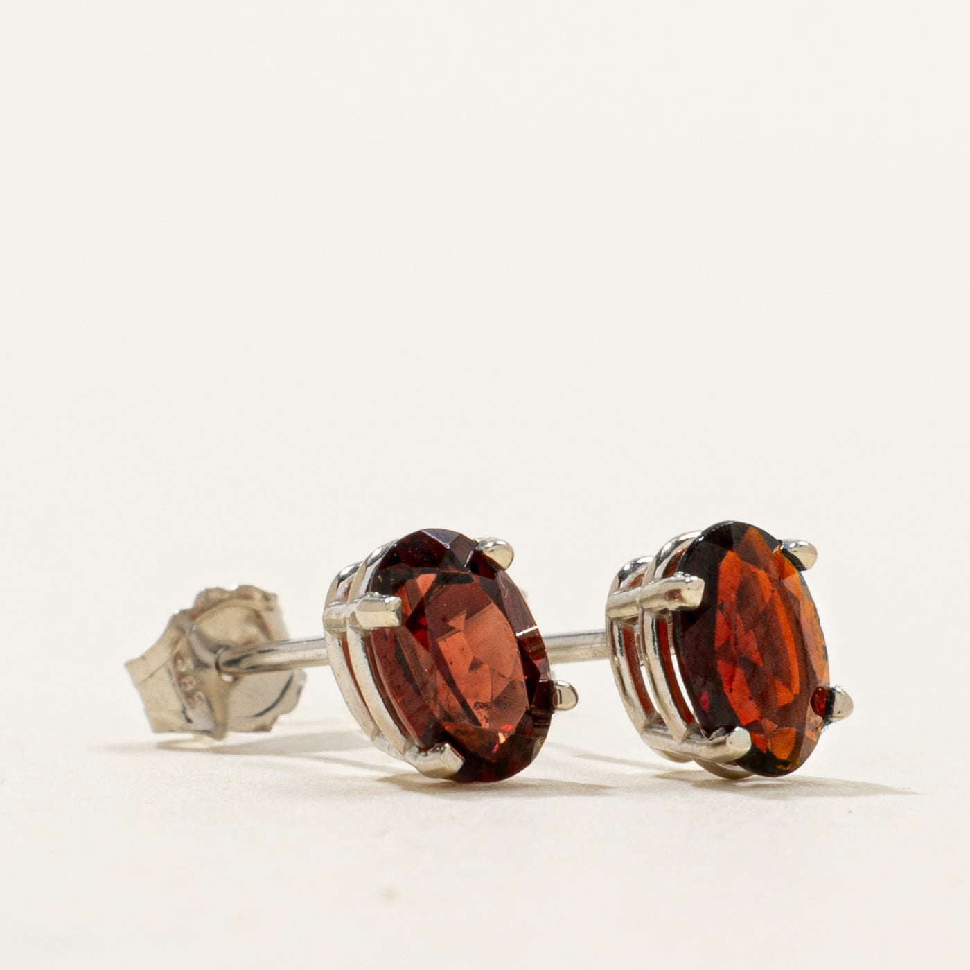 '100 Ways' Oval Cut Garnet Solitaire Stud Earrings | 1.05ctw