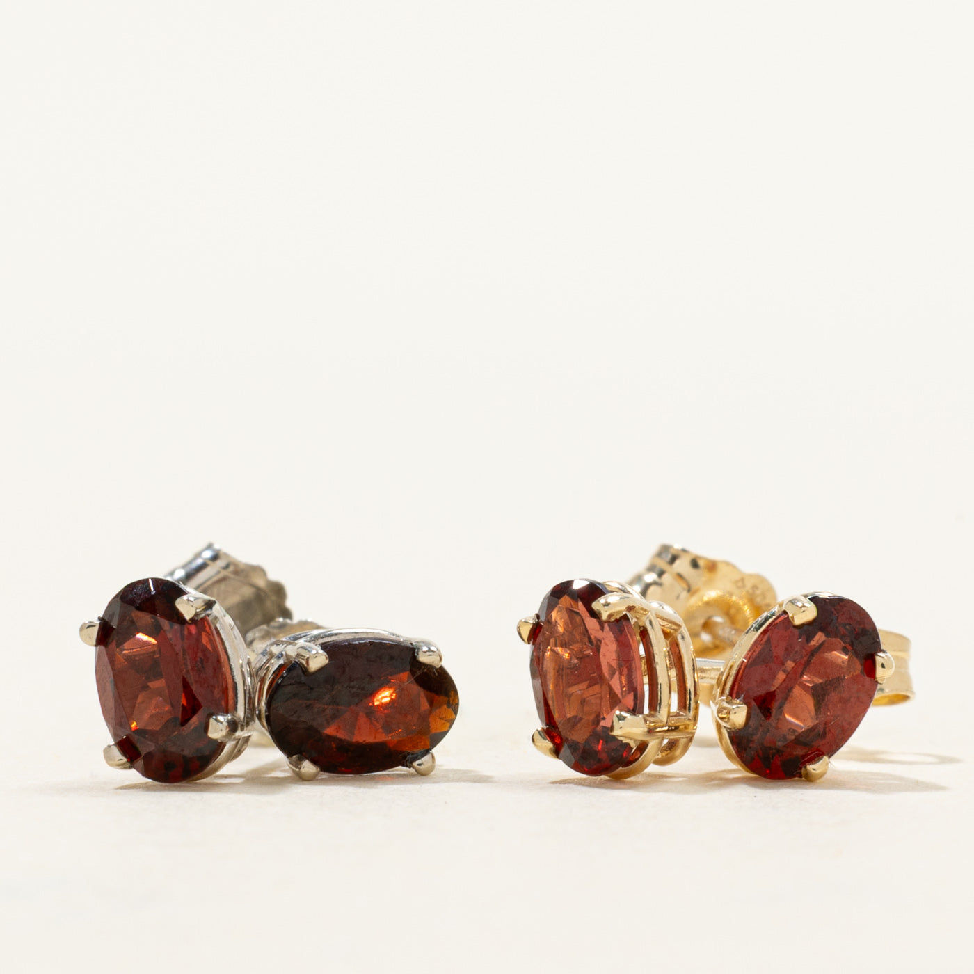 '100 Ways' Oval Cut Garnet Solitaire Stud Earrings | 1.05ctw