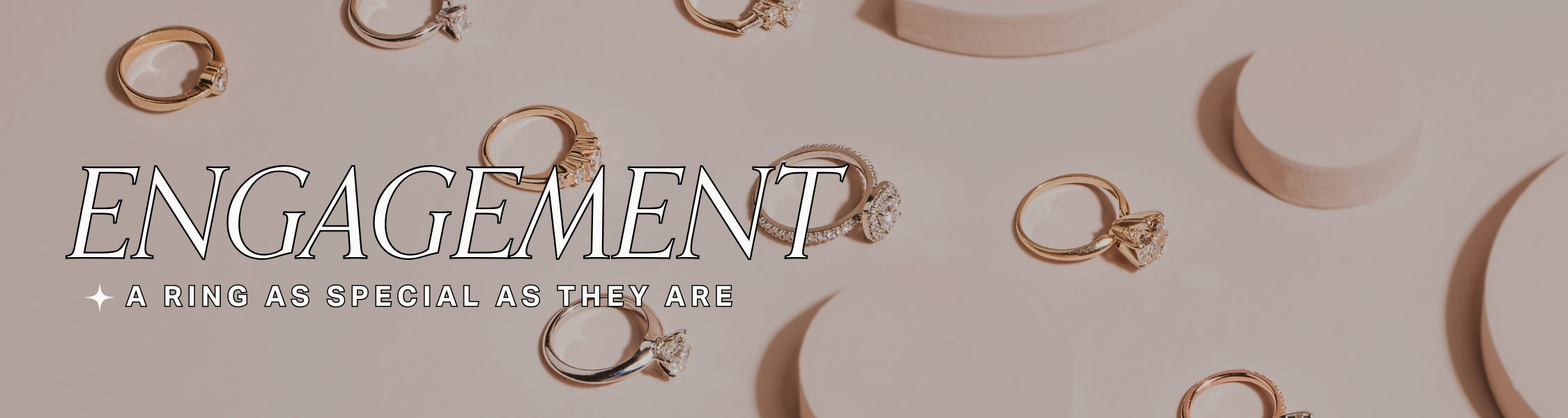 Engagement rings on a soft pink background. Title text reads: 'Engagement: A ring as special as they are'