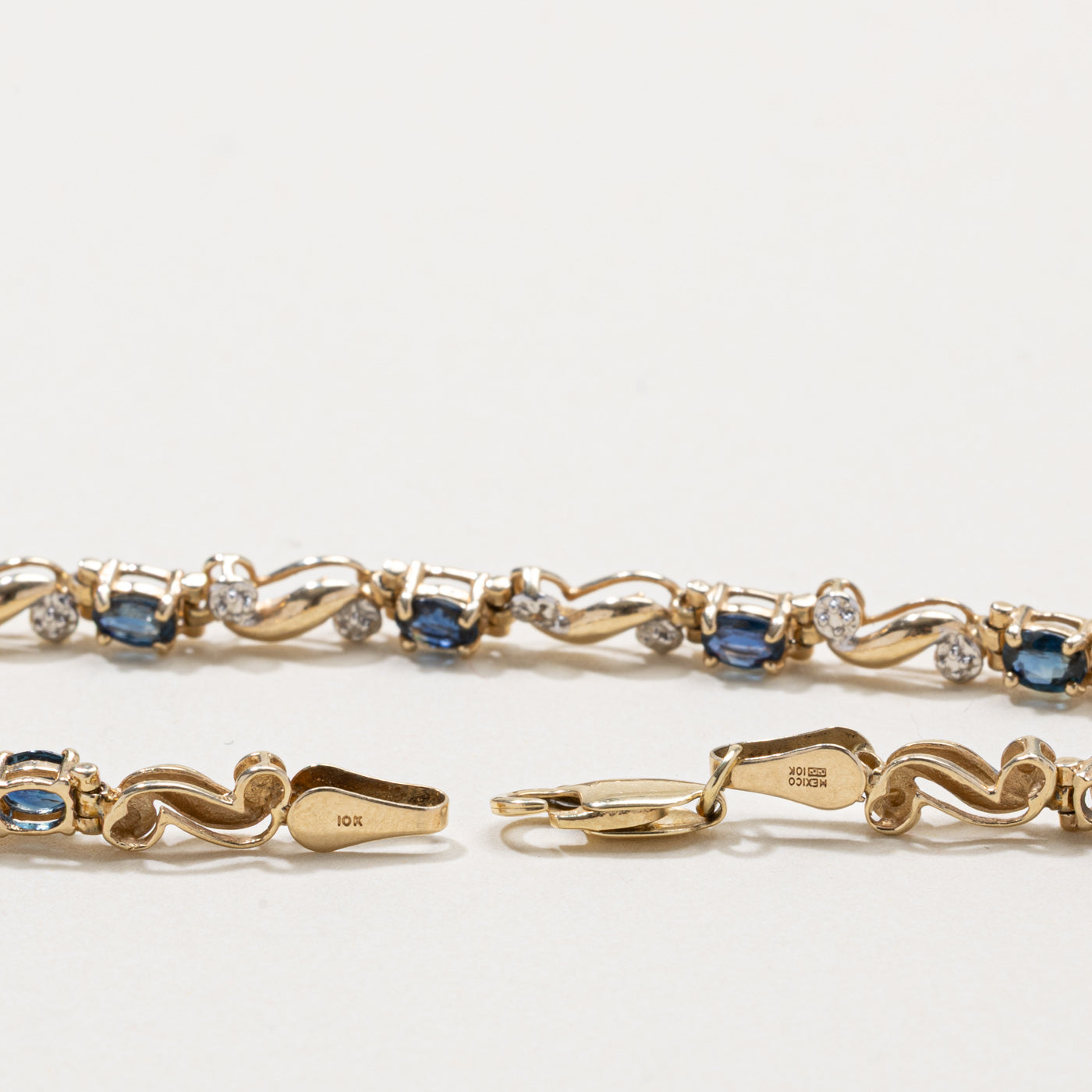 10k Sapphire & Diamond Swirl Gemstone Bracelet | 2.00ctw, 0.01ctw | 7.5"