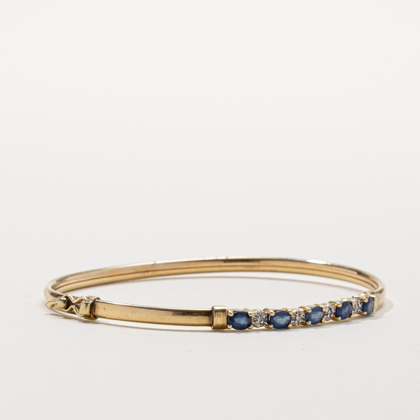 Five Stone Sapphire & Diamond Bangle Bracelet | 1.00ctw, 0.02ctw | 7"