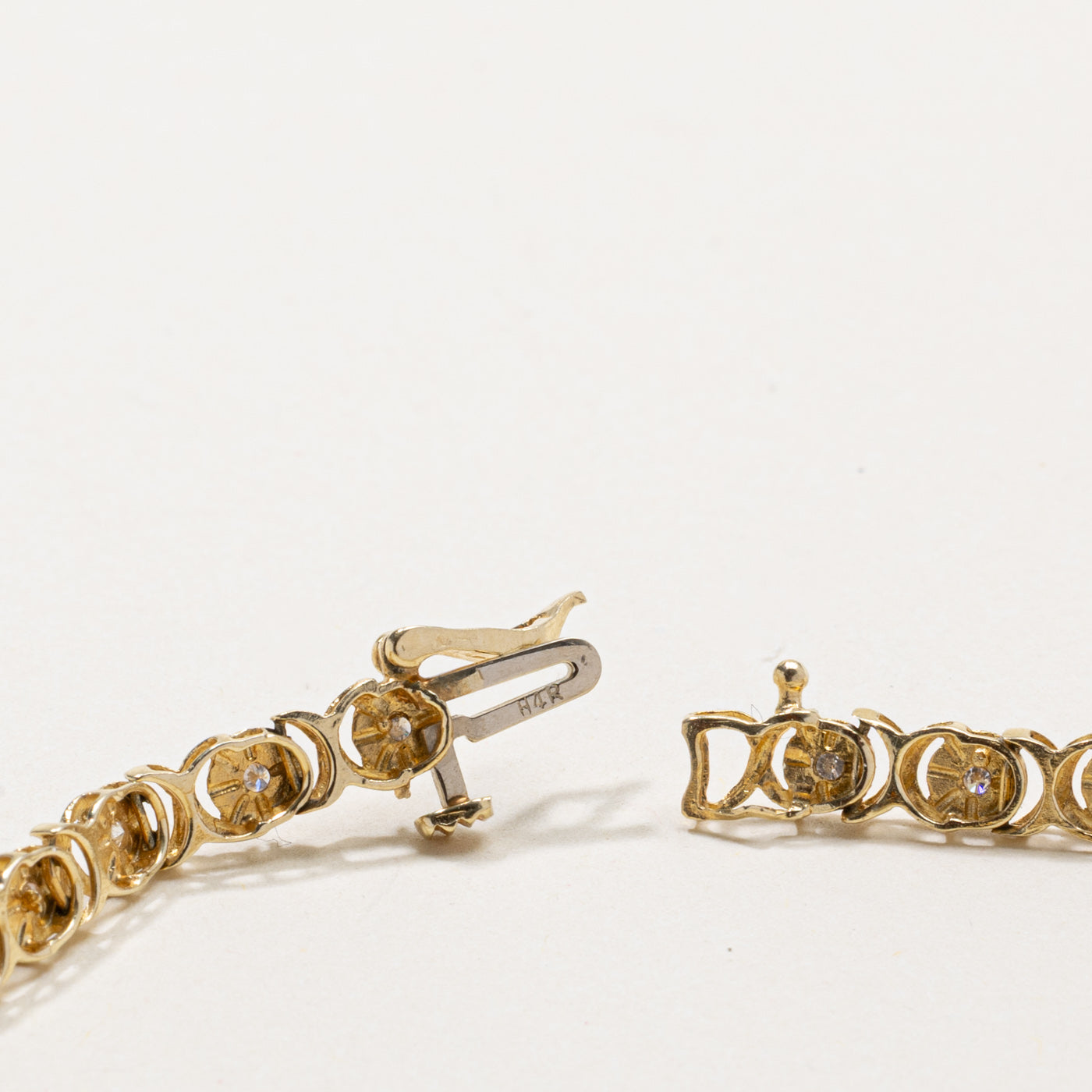 14k Illusion Set Diamond X Tennis Bracelet | 0.25ct | 7"
