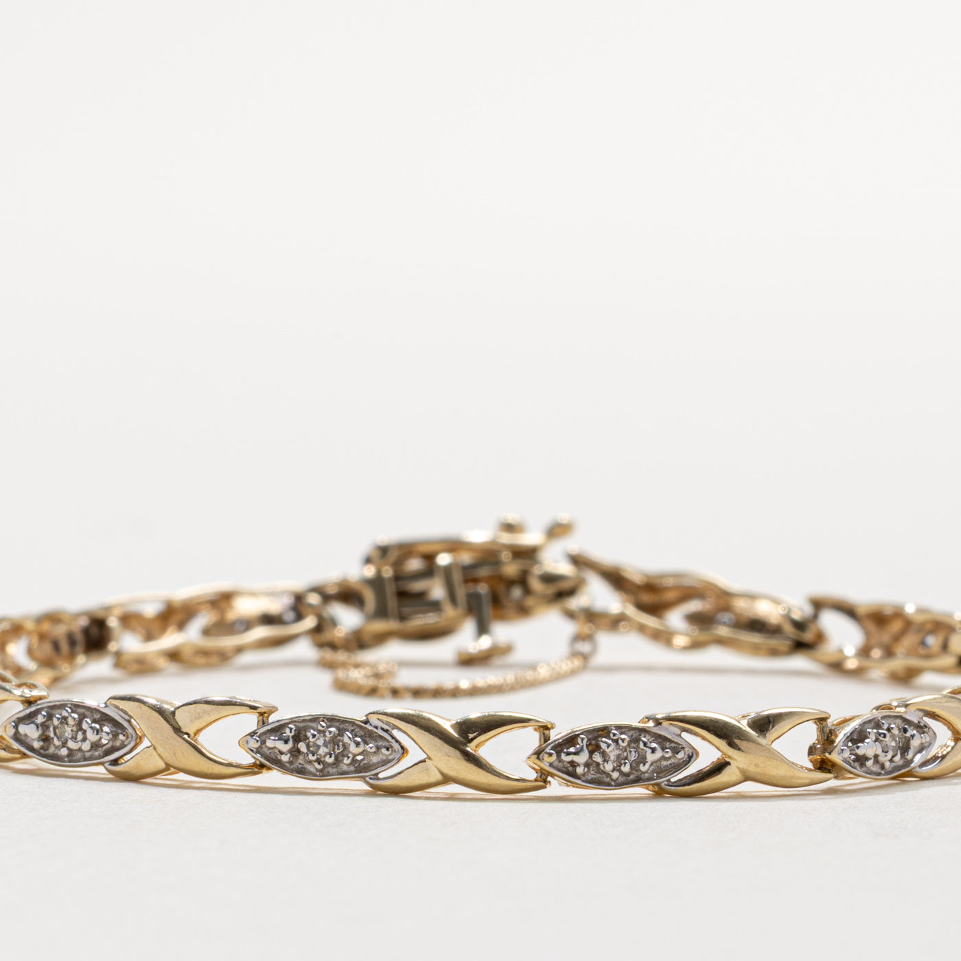 10k Diamond Geometric X Tennis Bracelet | 0.07ct | 7"