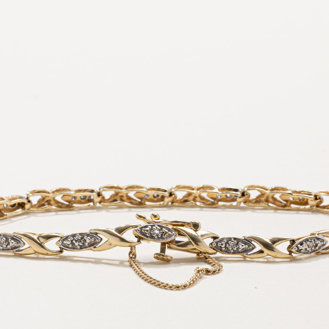 10k Diamond Geometric X Tennis Bracelet | 0.07ct | 7"