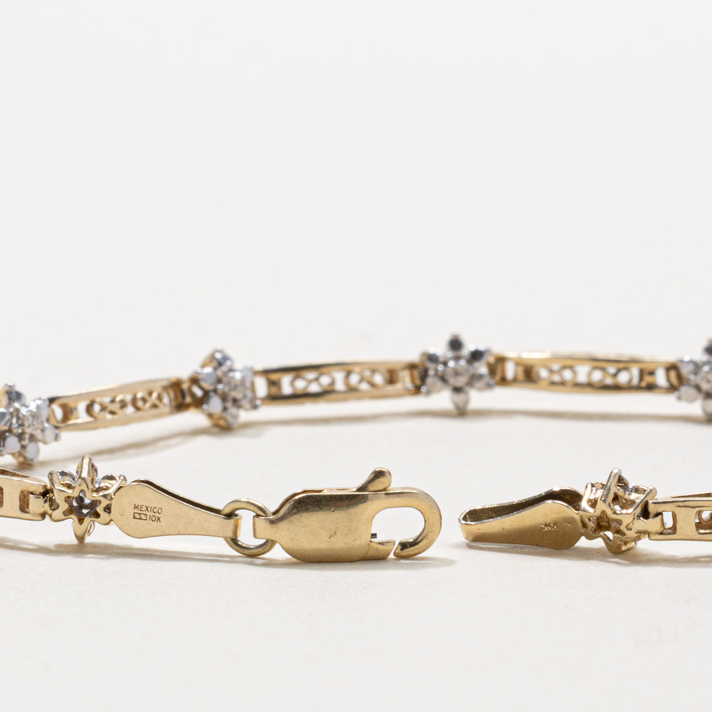 Diamond Floral Cluster Bracelet | 0.06ct | 7"