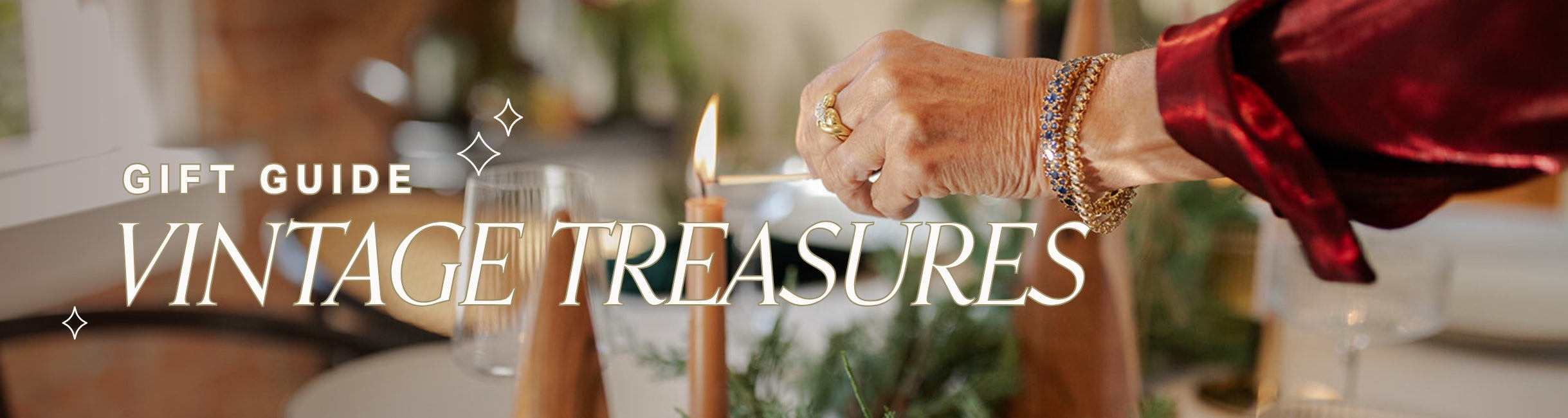 title text reads 'gift guide vintage treasures' displayed over image of woman lighting a candle wearing vintage gemstone bracelets at a holiday table